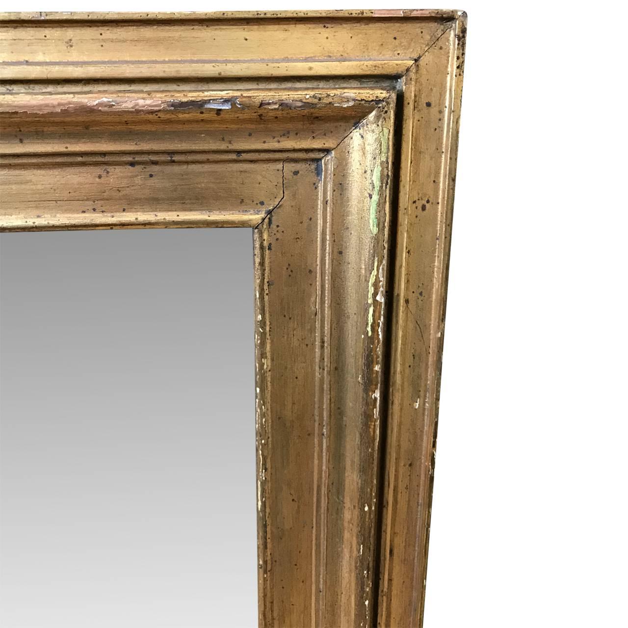 Charming Danish Empire wall mirror with original foxed mirror-glass.

 