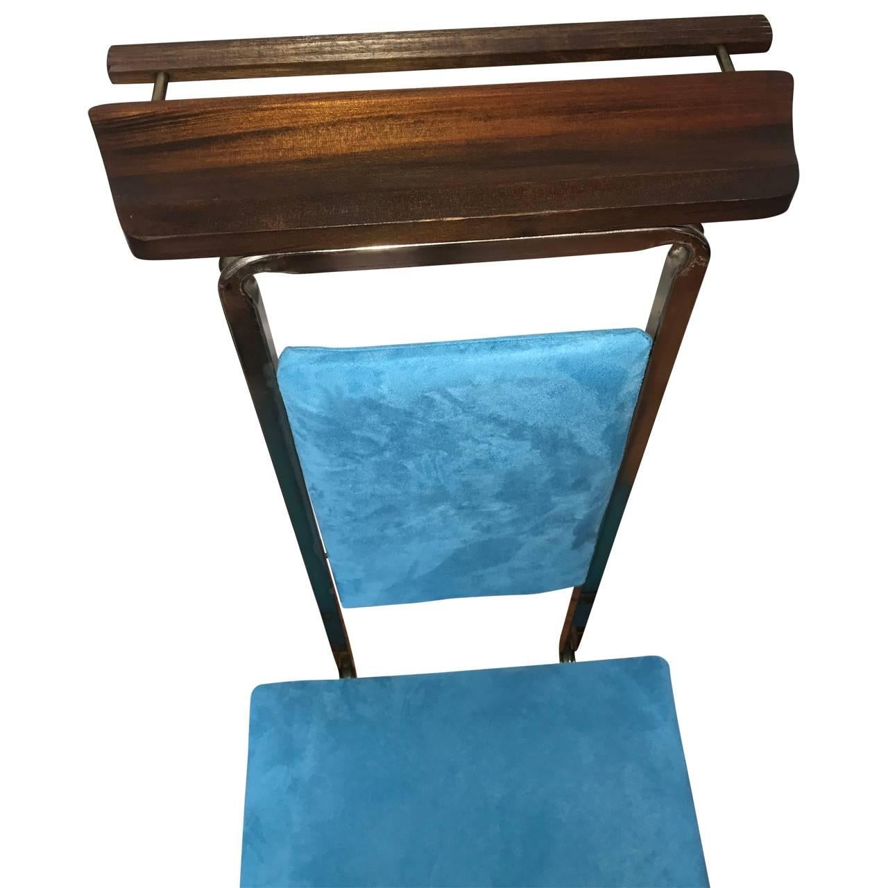 Newly upholstered vintage valet chair in a turquoise faux suede. Seat opens and can be used for storage.
$125 flat rate front door delivery includes Washington DC metro, Baltimore and Philadelphia