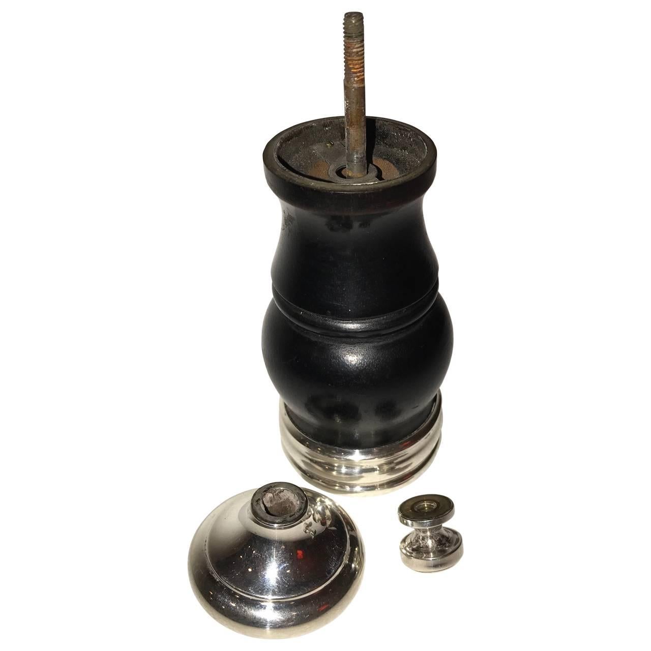 Vintage ebony and sterling silver pepper mill.