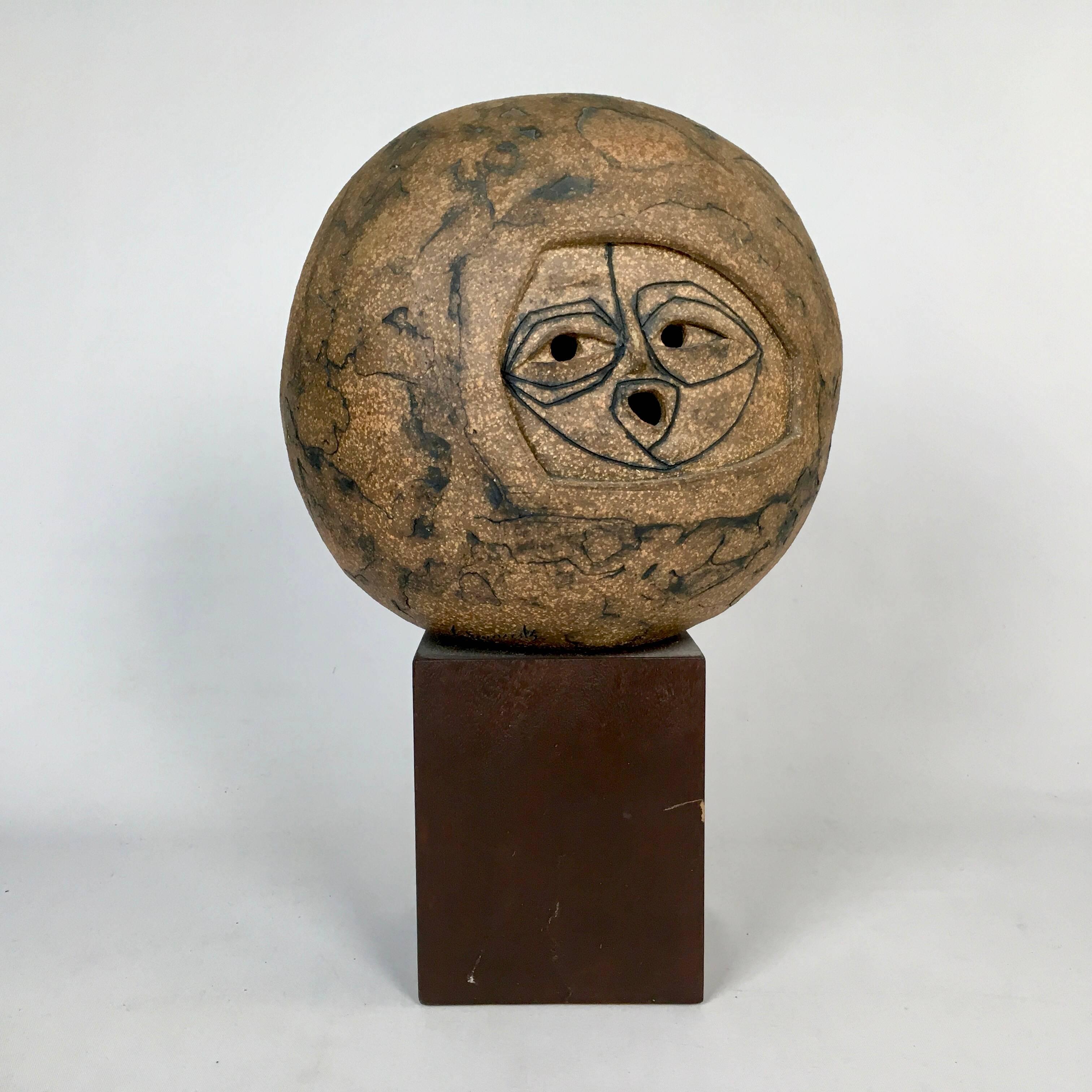 Rare abstract modern large stoneware pottery sculpture circa 1960s. Solid walnut square base. The Pottery is signed EDWARDS. 
 
Joel Edwards studied under Peter Voulkos at Otis College of Art & Design in 1954. Joel Edwards works are in the