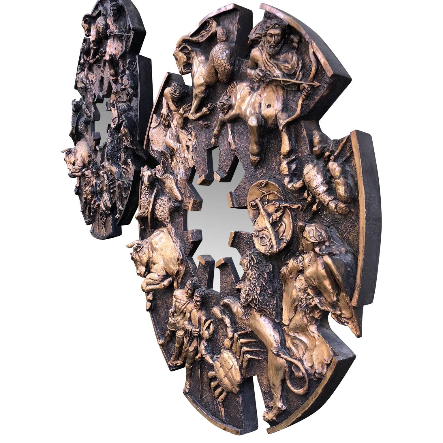 Pair of large round bronzed Zodiac sunburst wall mirrors.
The mirrors are sculpted of cast fiberglass and depicts each of the 12 zodiac signs. The mirror glasses in this pair are clear and in good condition.
 