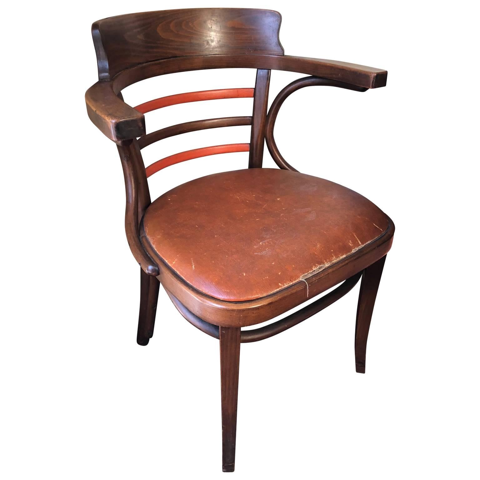Early bentwood arm or desk chair by J. & J. Kohn Mundus, this one with red painted horizontal back bars.

$125 flat rate front door delivery includes Washington DC metro, Baltimore and Philadelphia