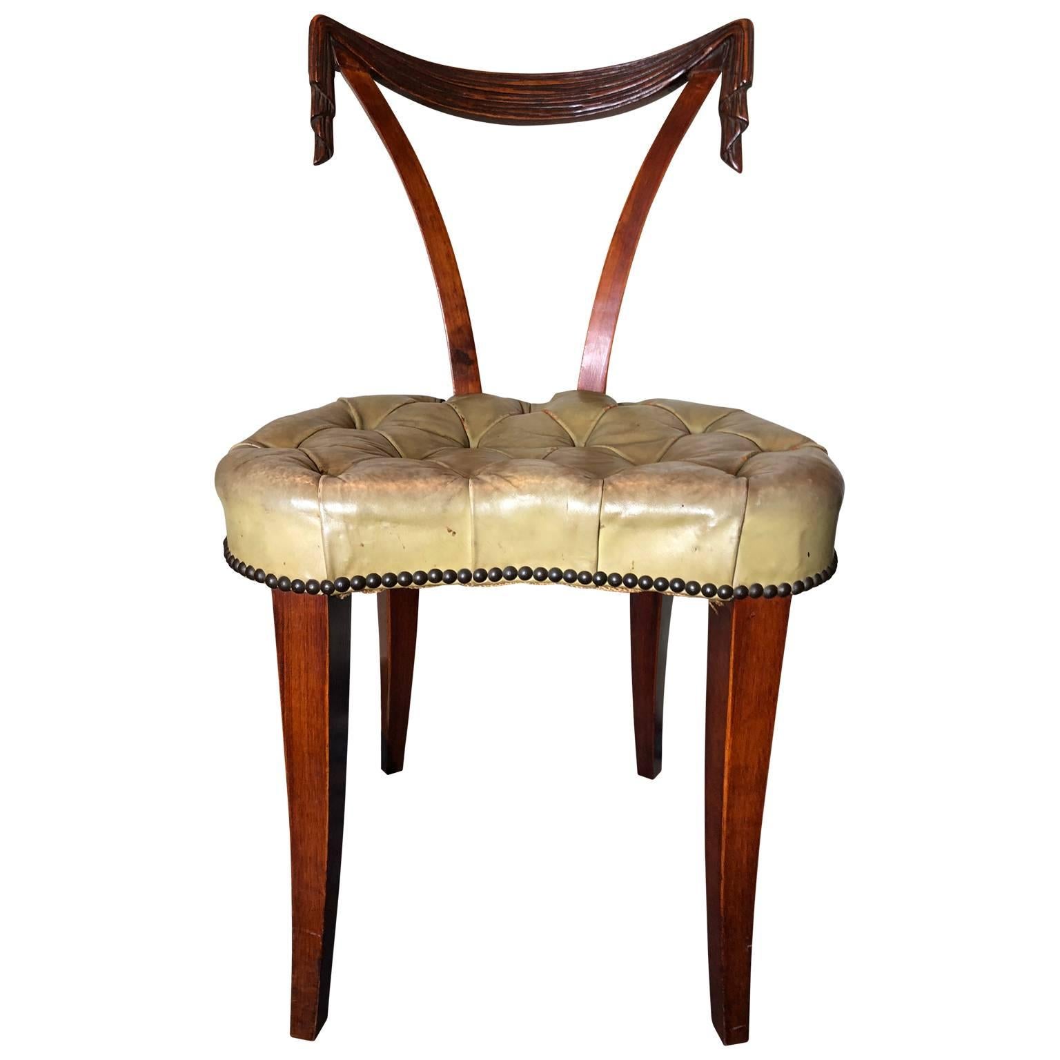 1940s Hollywood Regency draped chair that can be used as a vanity or desk chair. The upholstery is the original leather.
$125 flat rate front door delivery includes Washington DC metro, Baltimore and Philadelphia

 