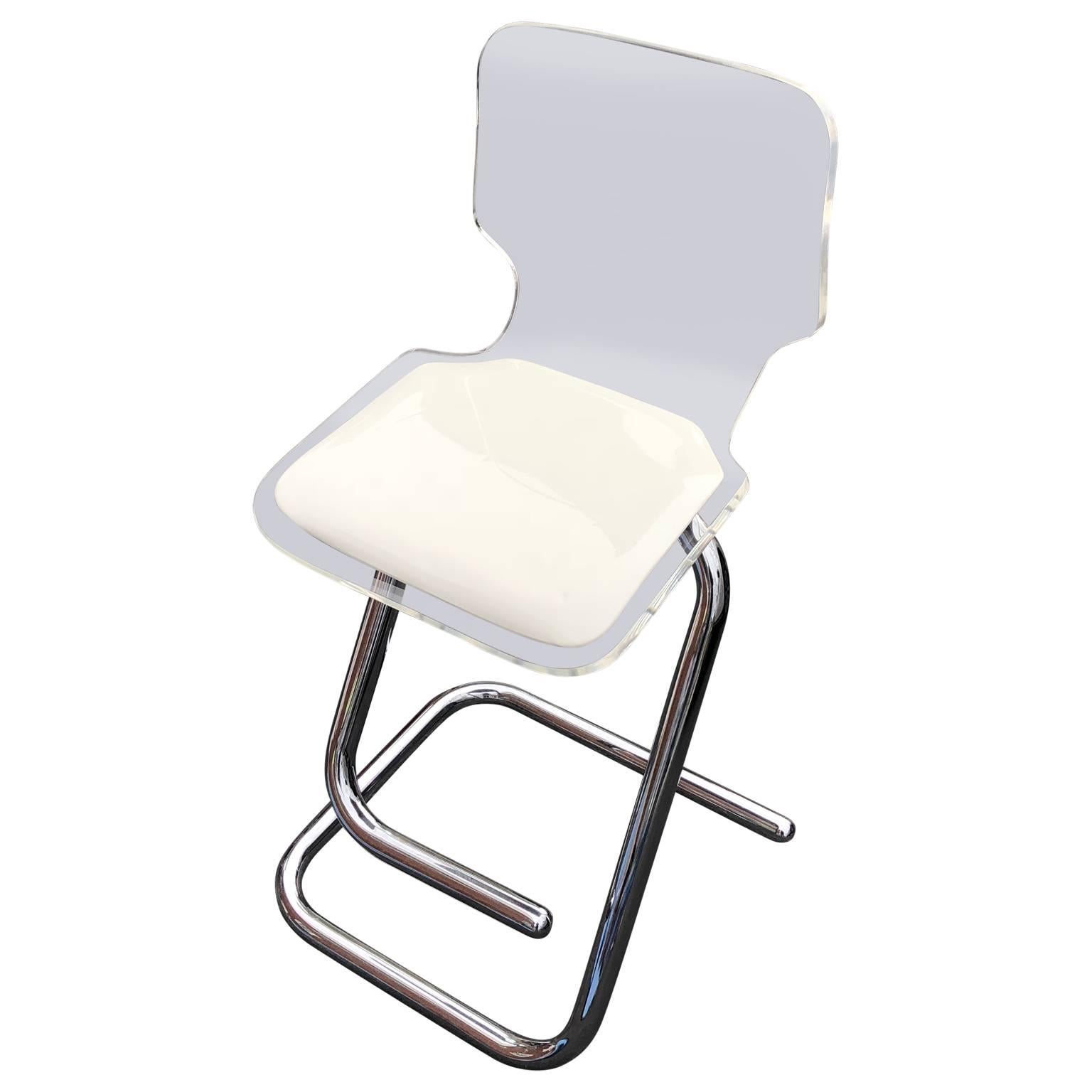 Single Luigi Bardini Lucite and chrome bar stool. The stool is in good sturdy condition and has the original white vinyl seat cover.
 
$125 flat rate front door delivery includes Washington DC metro, Baltimore and Philadelphia.