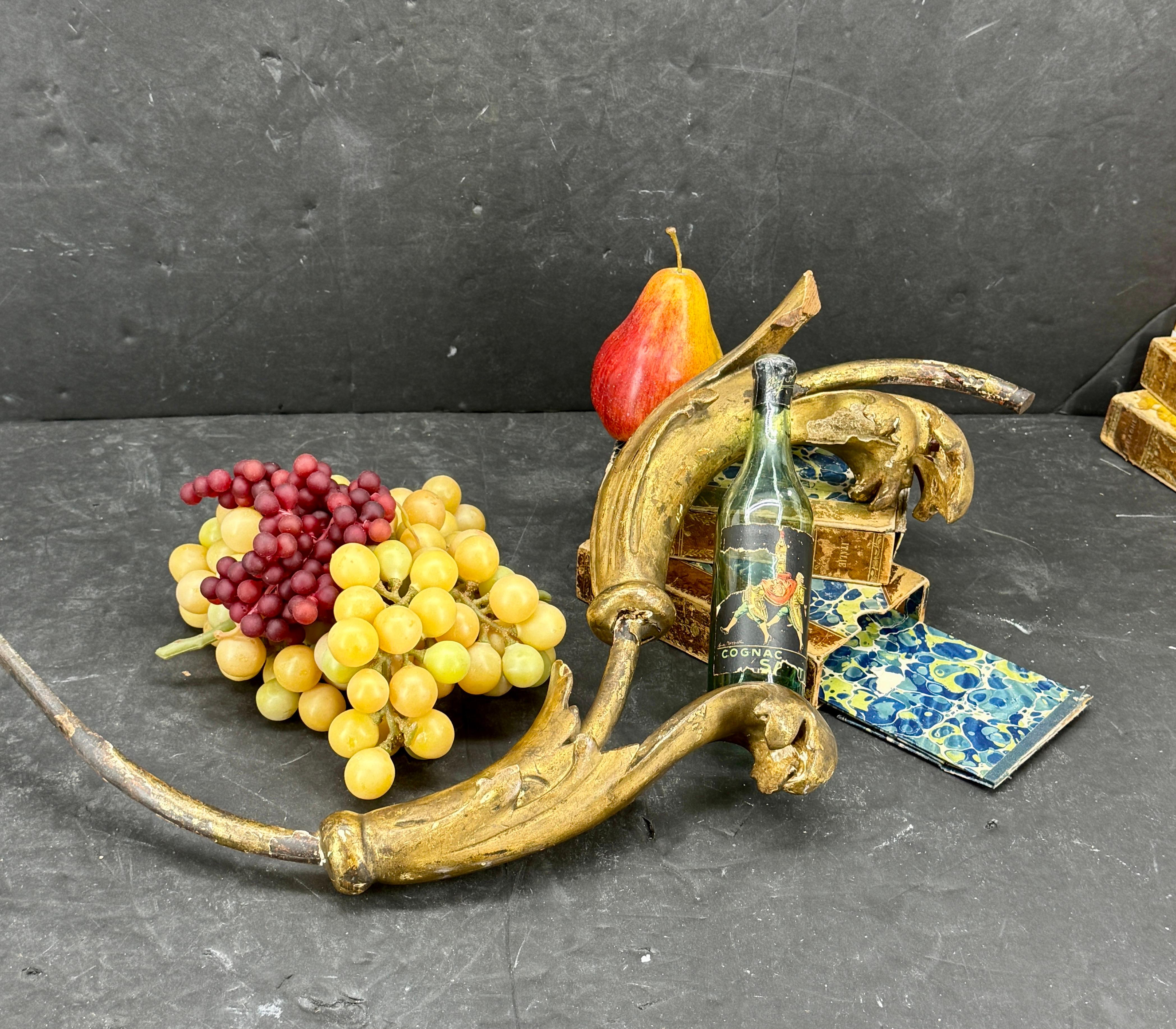 French gilded Rococo tall metal wall or table fragment. Beautiful period Rococo design constructed in gilt featuring intricate scroll motifs throughout. This large hand gilt piece would be a wonderful architectural element standing alone on console
