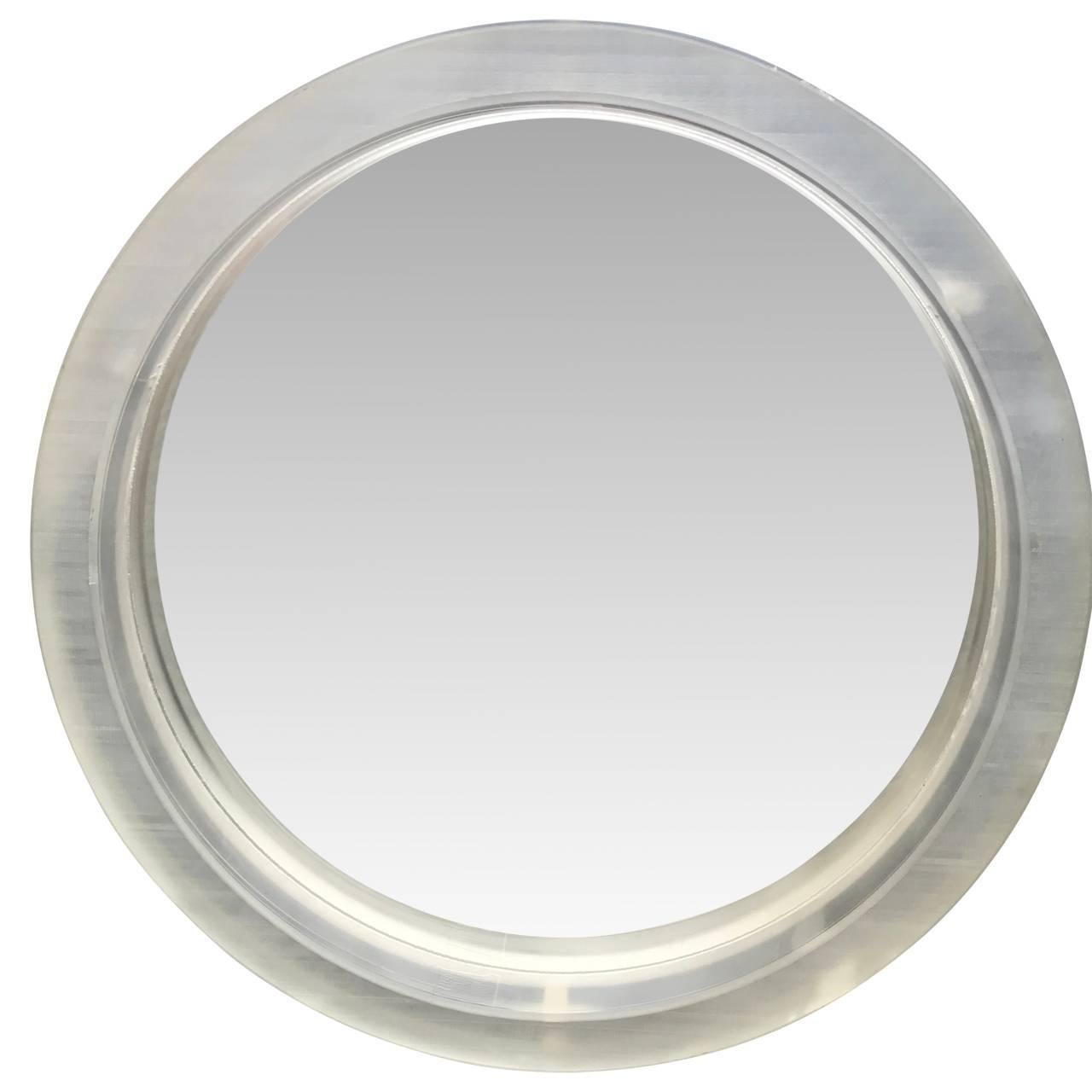 3 inch thick circular rough-cut mirrors.
A single thick framed acrylic or Lucite mirror. The surface on the mirror is rough and individual, due their handcrafted cut. Please request additional images of the individual wear to the frames. The mirror