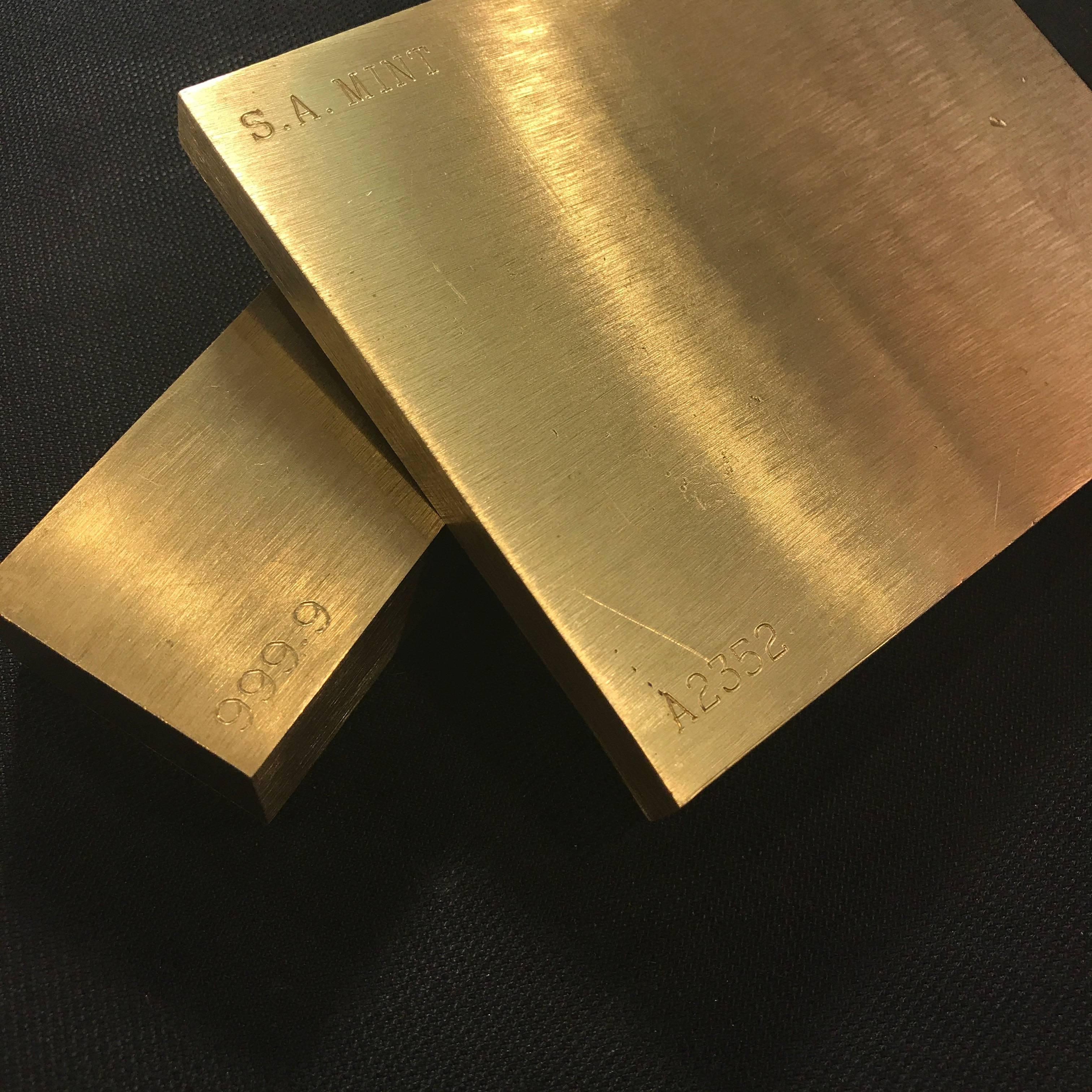 20th Century Set Of Two Gold Bar Style Brass Paperweights