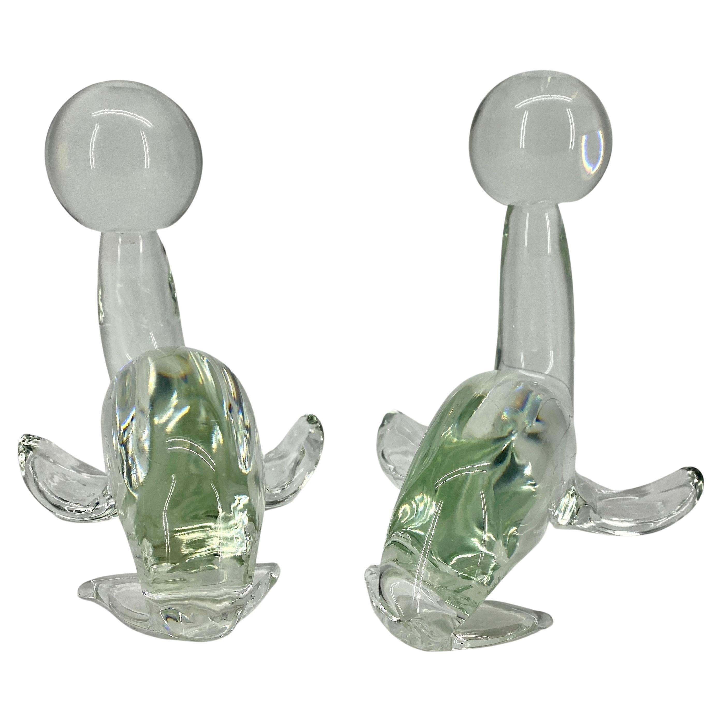 Pair of large heavy hand-blown clear Murano glass seal sculptures by Licio Zanetti.
In 1956 Zanetti Vetreria Artistica was founded by the Glass Master Oscar Zanetti and his son Licio. Licio Zanetti is world renowned for his Murano glass sculptures.