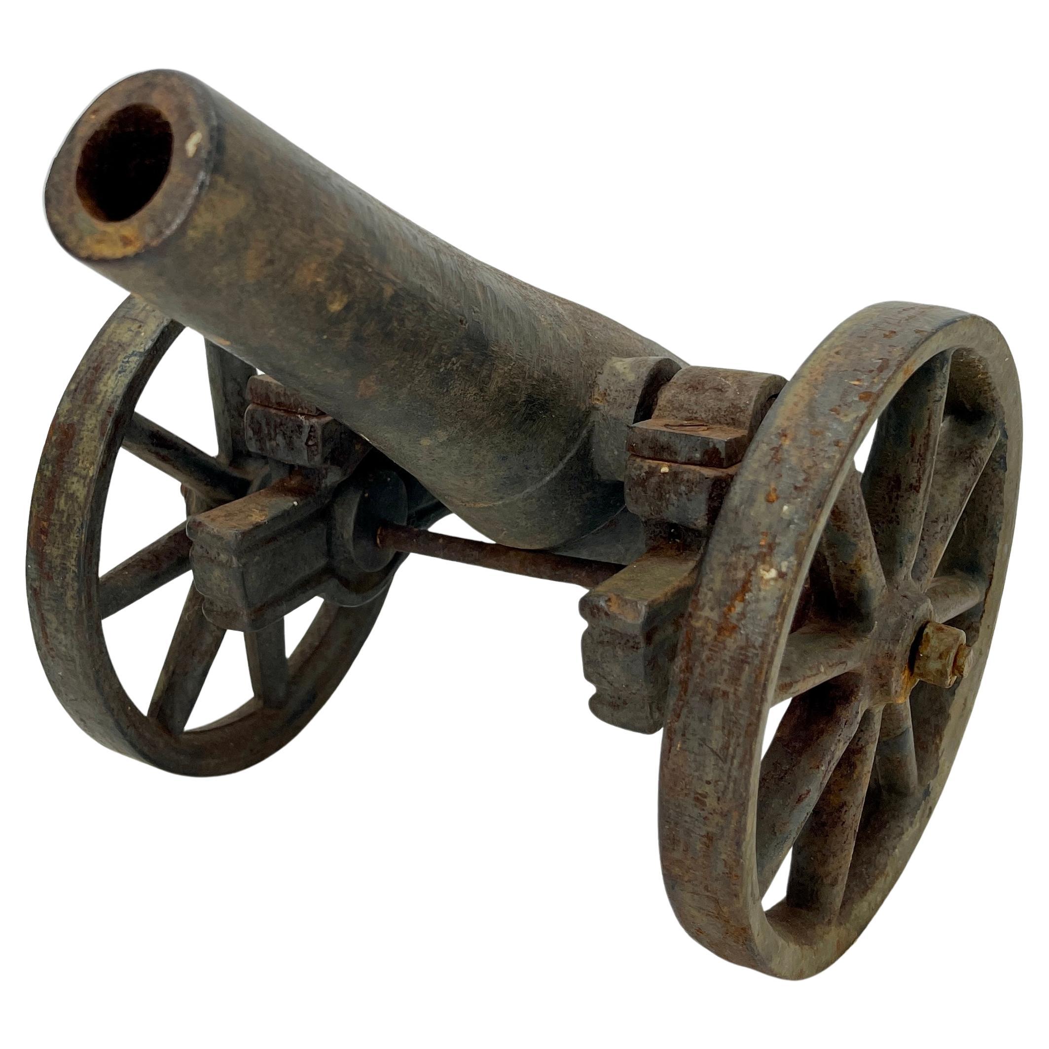 American Small Early 20th Century Iron Cannon Desk Accessory with Eagle-Head Decoration For Sale