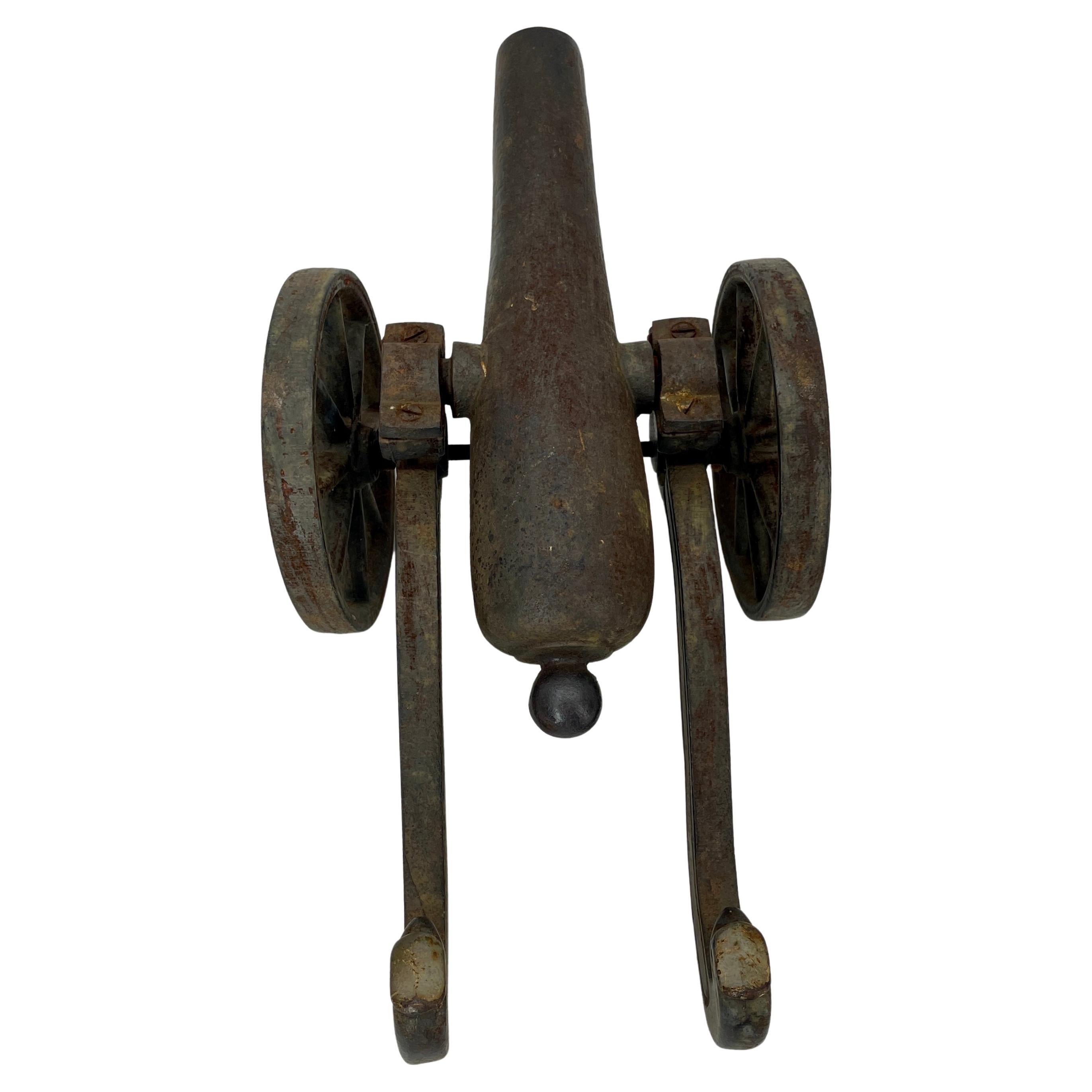 American Colonial Small Early 20th Century Iron Cannon Desk Accessory with Eagle-Head Decoration For Sale
