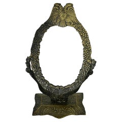 Petit miroir de coiffeuse Art Déco avec décor d'aigle double
