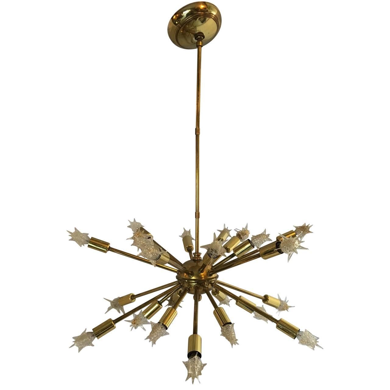 Medium size brass Sputnik chandelier with 24 original lightbulbs.