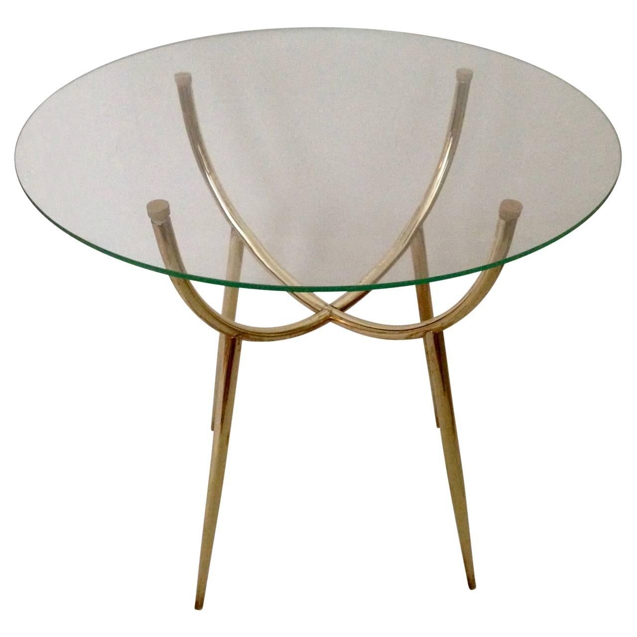 Very charming small brass and glass table in Gio Ponti style.
