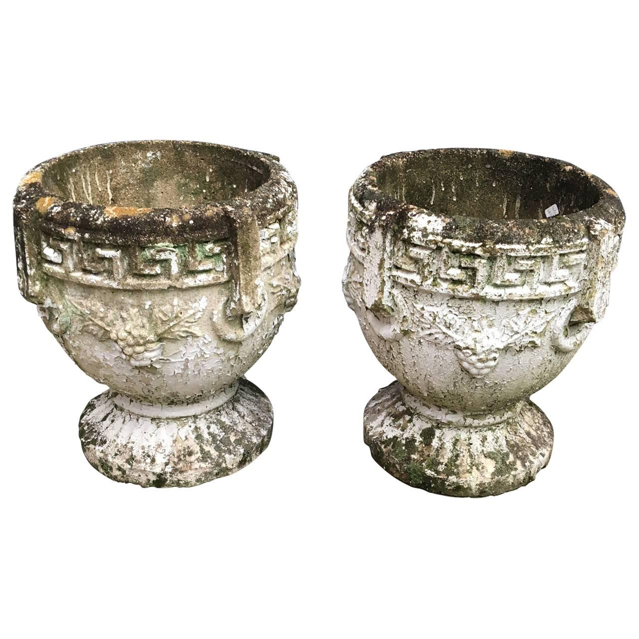 Charming pair of planters with great patina.