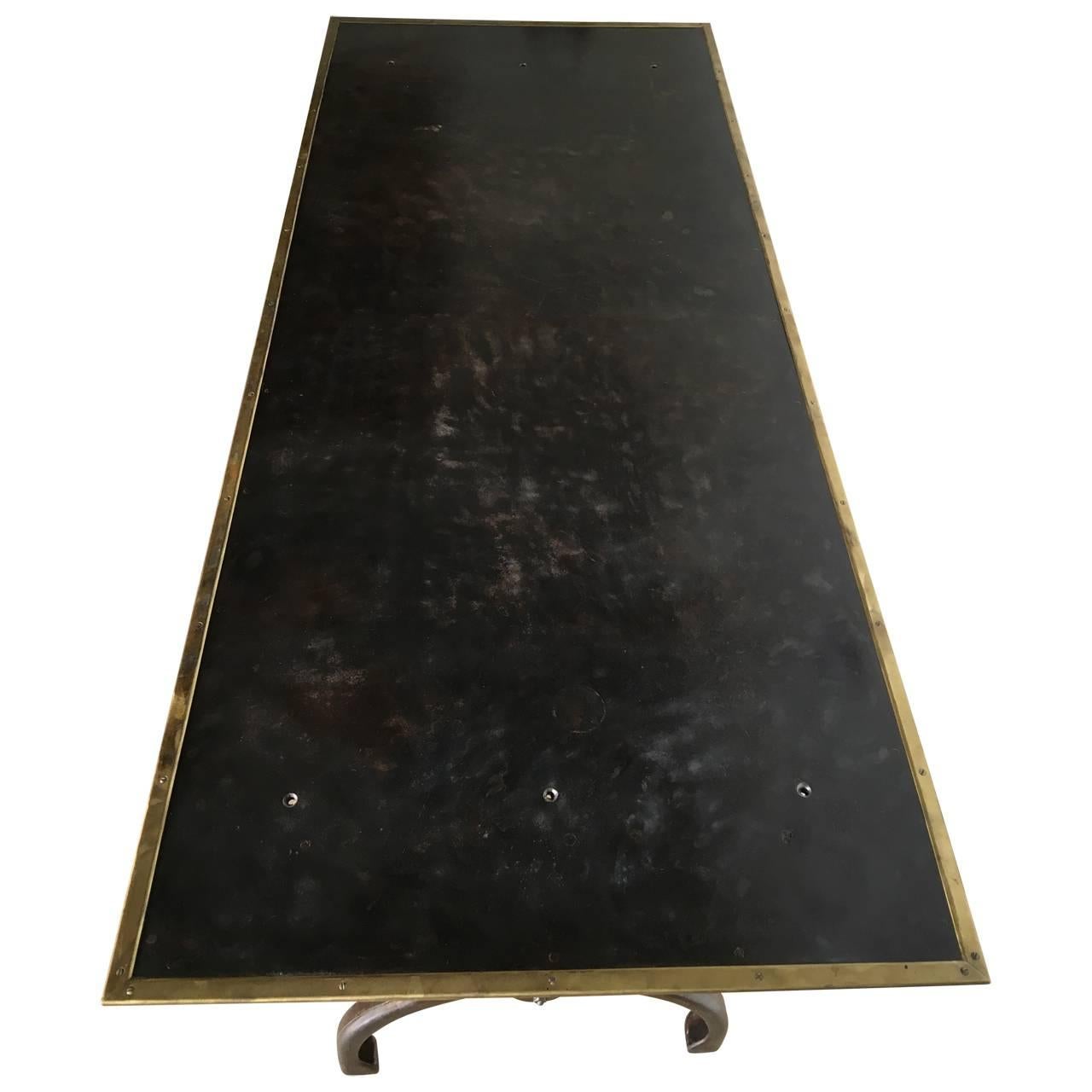 Amazing cartographers table, with provenance of The Original National Geographic Society, headquartered in Washington, D.C. Solid and stabile steel base and brass frame with unbeatable patina.