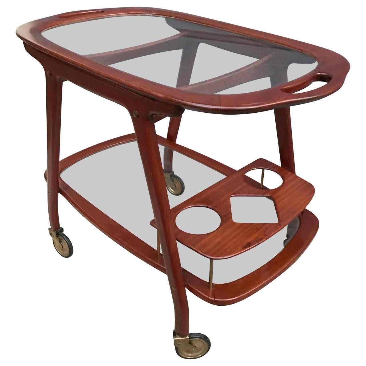 Italian two-part bar trolley. Top glass part comes off and serves as a tray.