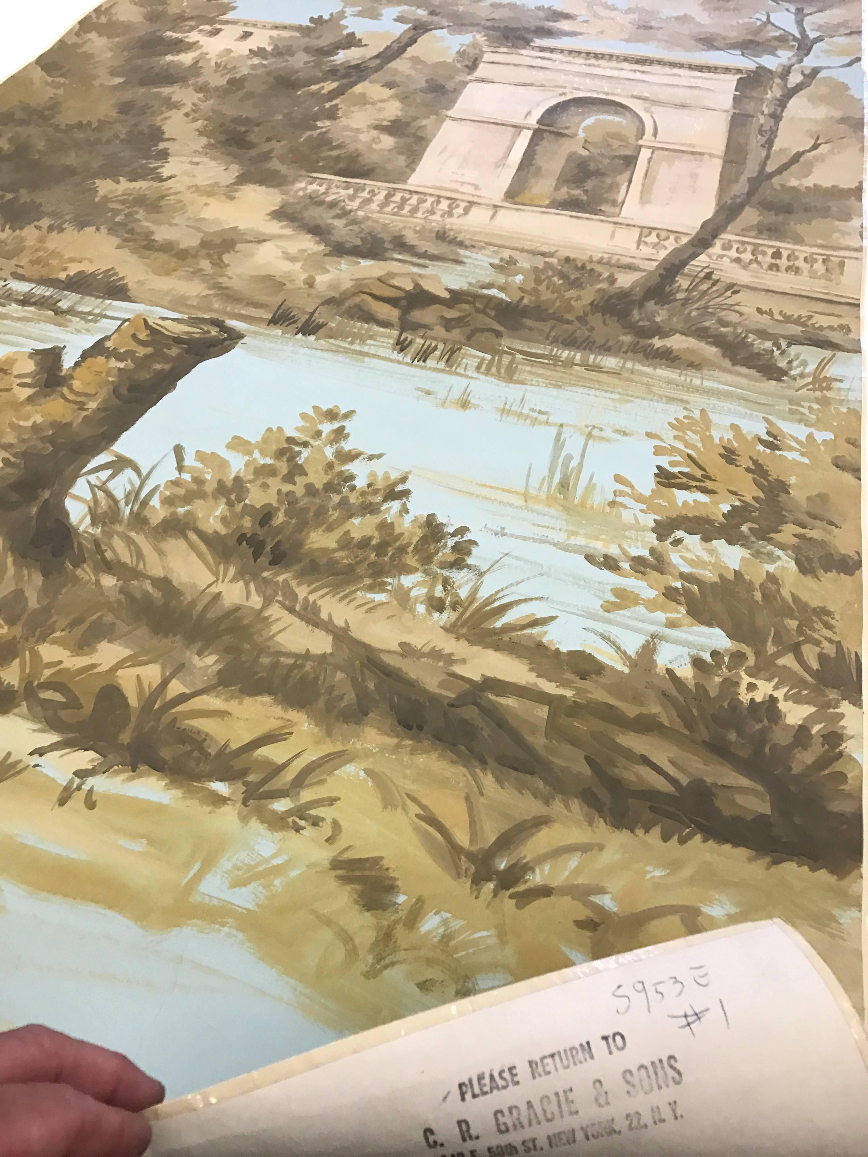 A pair of vintage Gracie Chinese hand-painted wallpaper panels, in the style of French Country Toile. Pale green background detailed with charming depiction of architecture, persons and waterway in the style of French Country Toile in mocha and