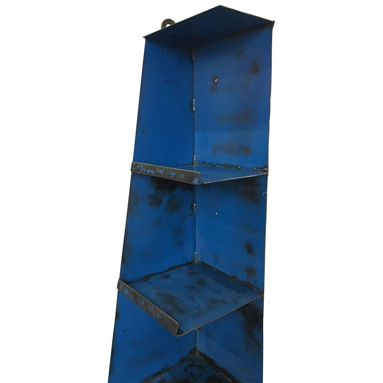 Blue Industrial corner shelf on wheel.