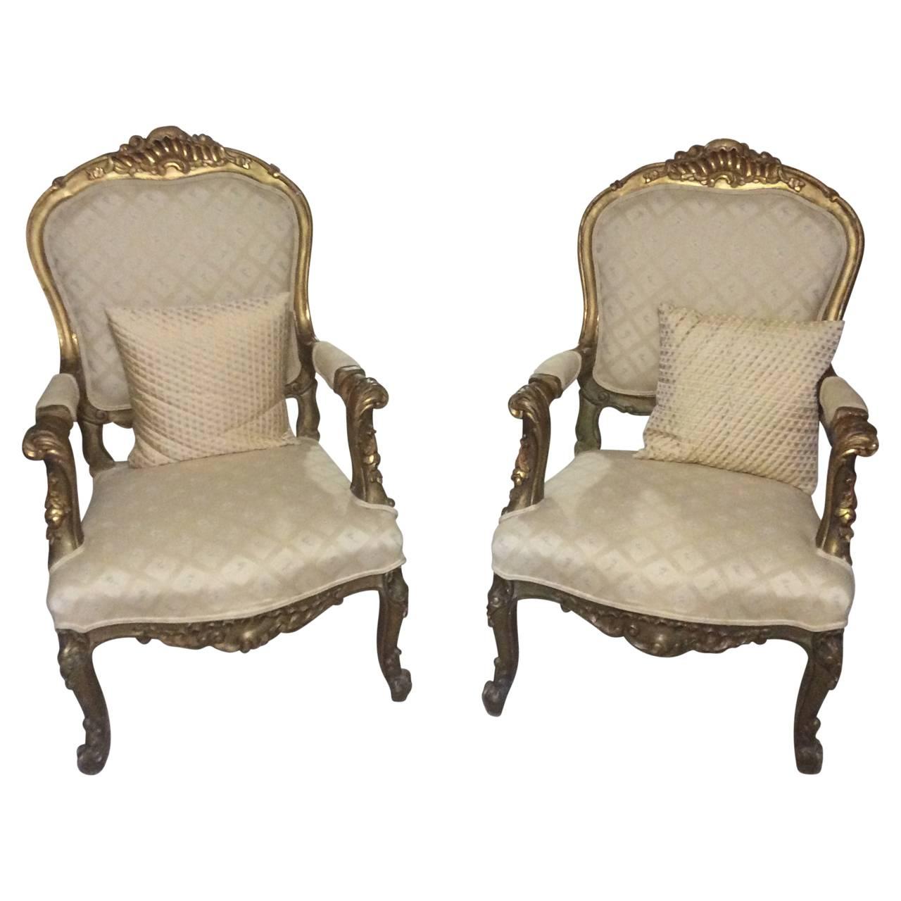 Pair of French Louis XV Style Giltwood Amrchairs