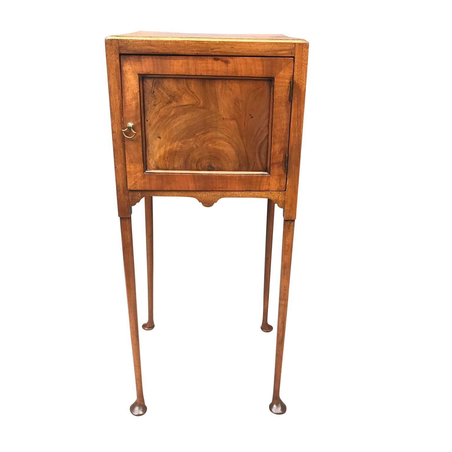 Small English Regency table with very skinny legs and square compartment. Door and side table in good working condition.