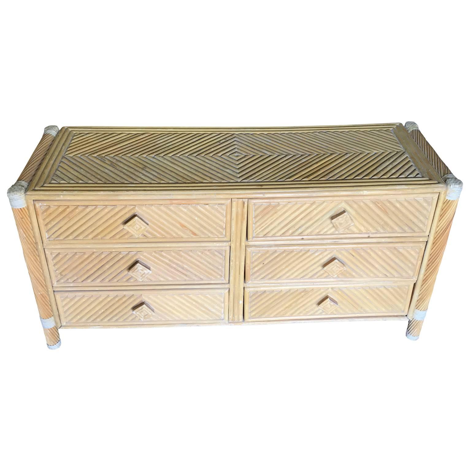 Six drawer dresser in pencil reed rattan in geometric pattern.