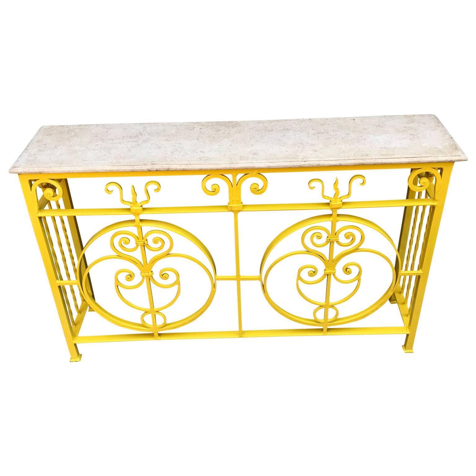 Set of two sunshine yellow garden console with profiled marble top.
