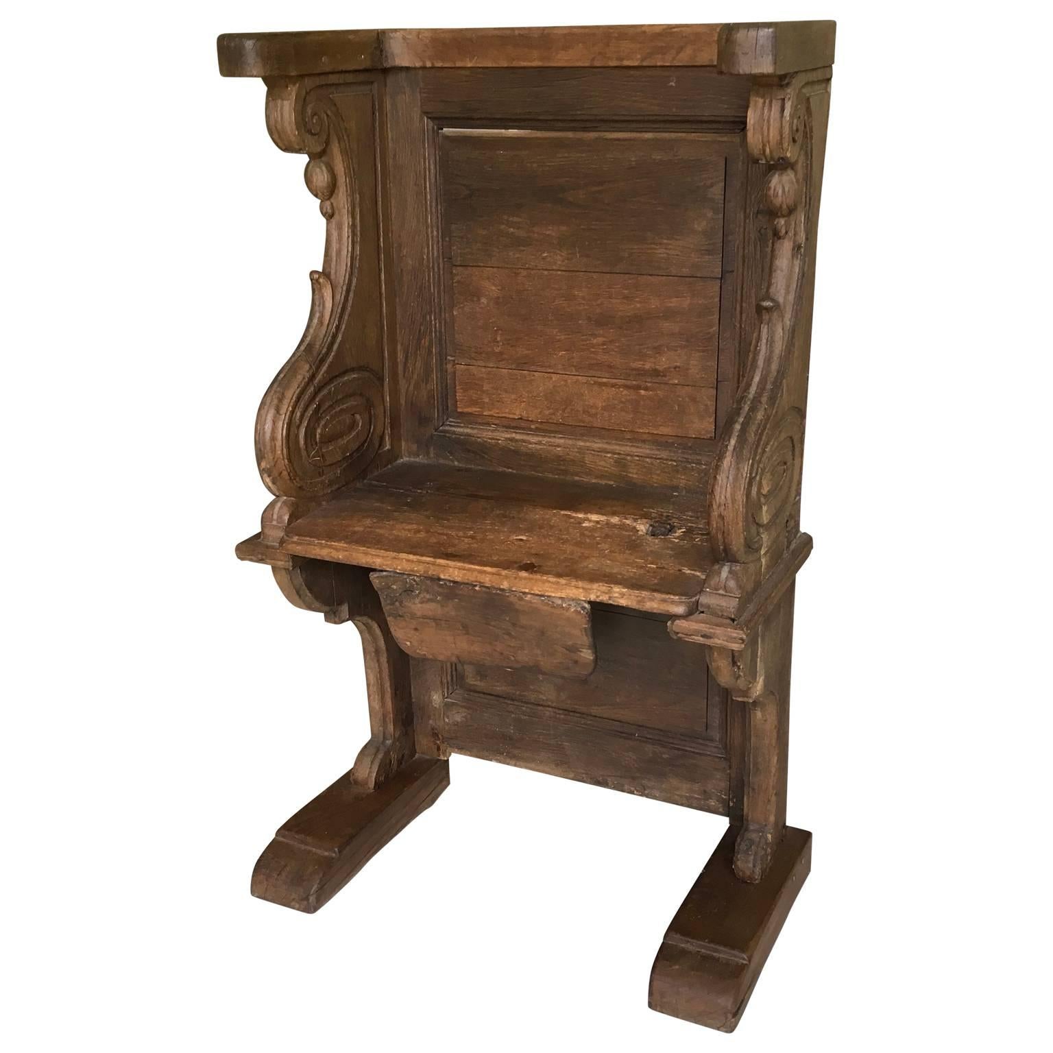 Gothic Medieval cathedral oak Misericord bench, circa 15th-17th Centuries. This beautiful small bench or chair stall was often found in Medieval Cathedrals and churches attached to collegiate or Monastic and charitable institutions. Seat can be