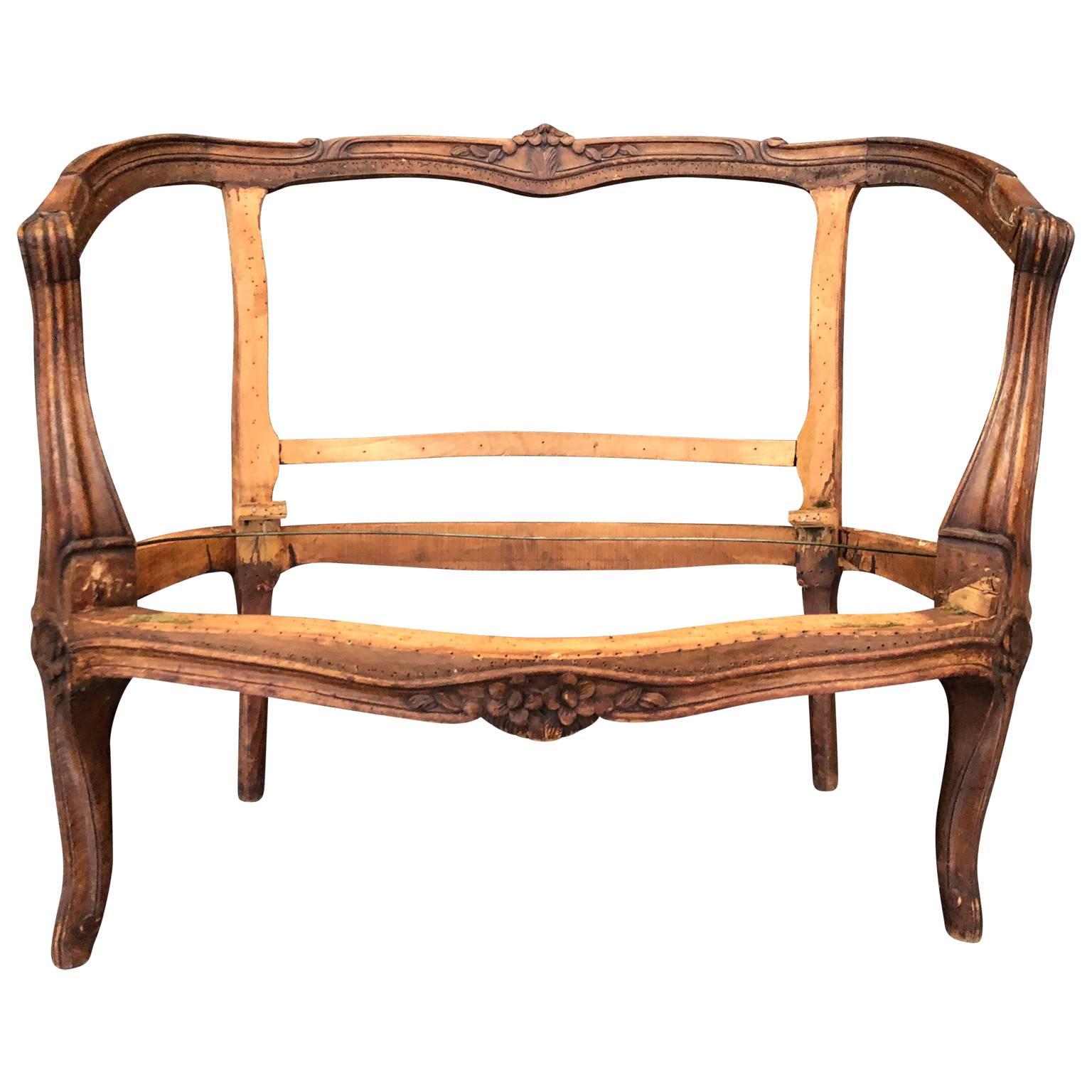 French Rococo two-seat settee armchair frame.
 
