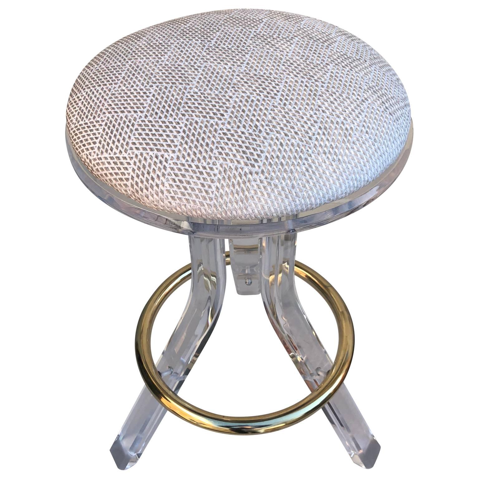 Single 1970s Lucite vanity stool with brass foot rest