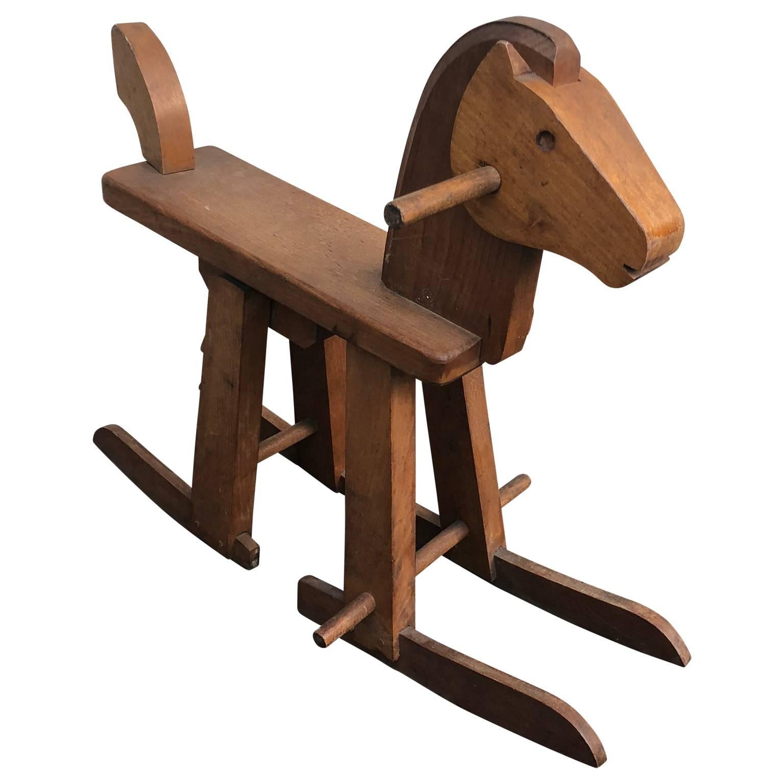 Vintage Kai Bojesen Style Rocking Horse. The child's rocking horse is in classic Danish clean and sturdy design. Perfect for any nursery or child's bedroom, the horse works fine. This is a sweet addition to any child's room.