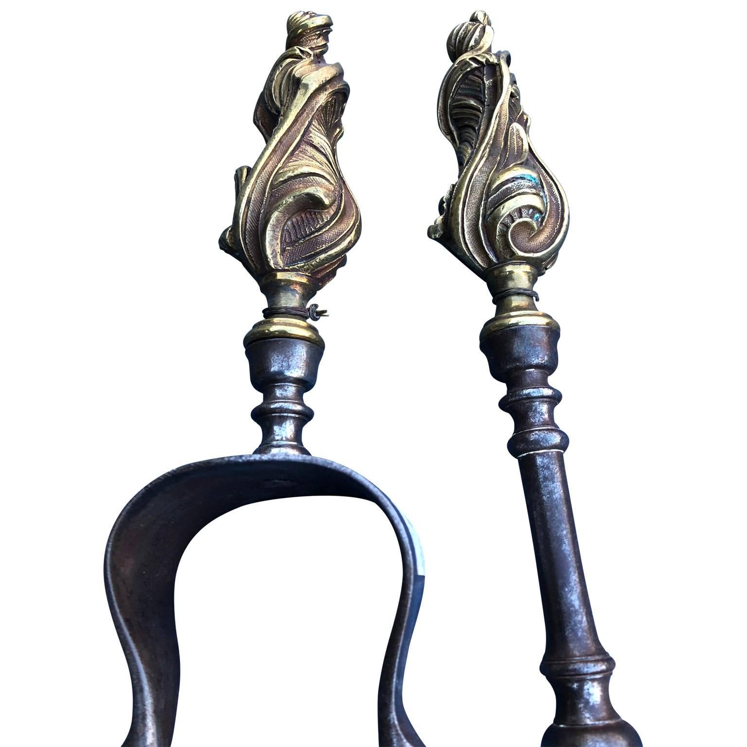 Set of 18th century fire place tools with bronze finials and iron hardware.