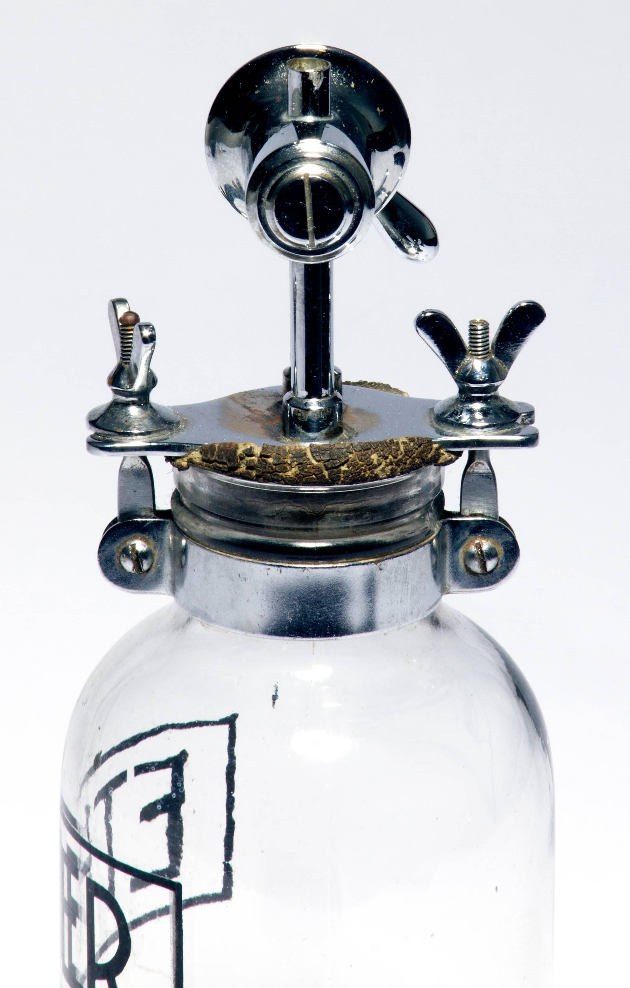 This is an interesting ether bottle that was probably used in an operating room.