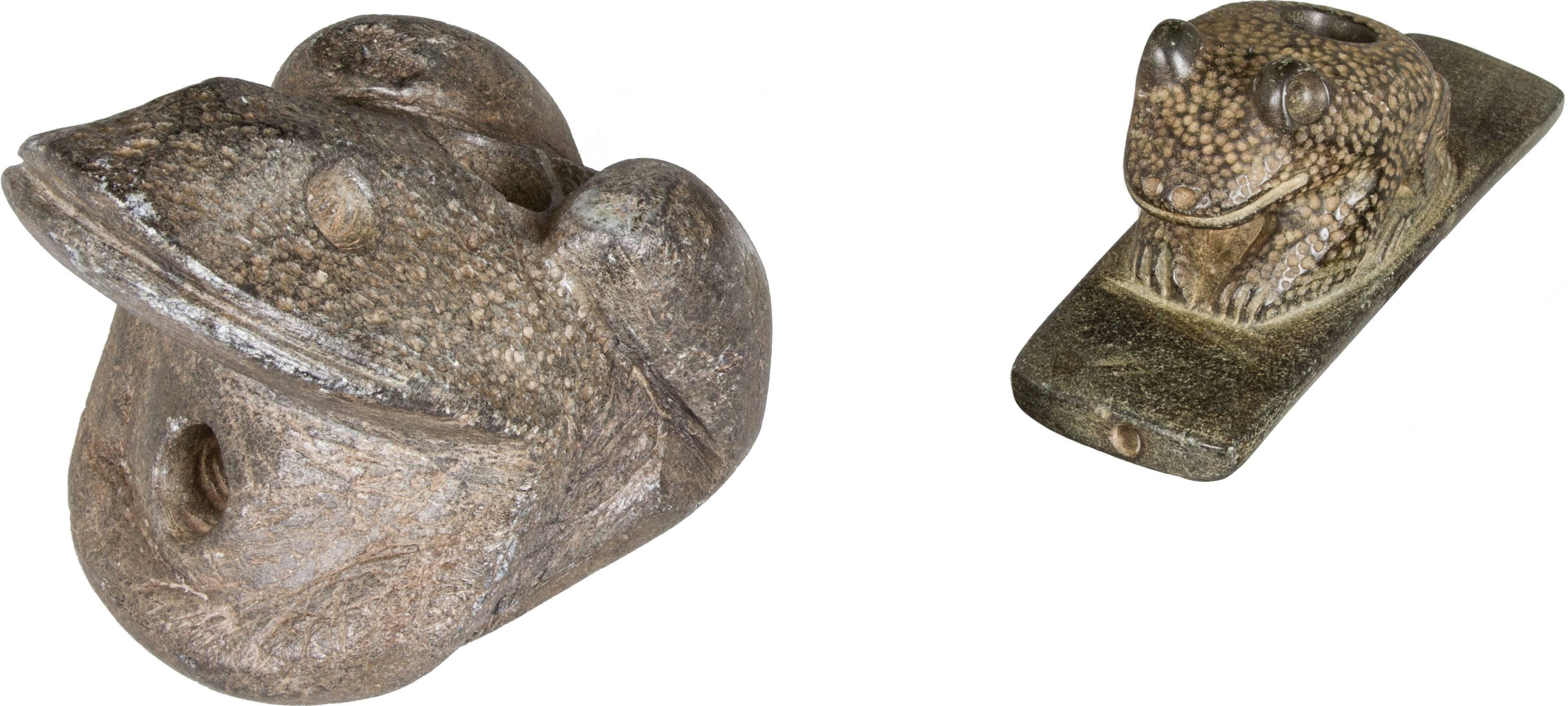 These are nicely carved textural frog stone pipes. They all have holes bored on the top and in the front. The largest frog's measurements are below.  These were deaccessioned from a museum collection.
The smallest frog is 5.25 long x 2 wide x 2