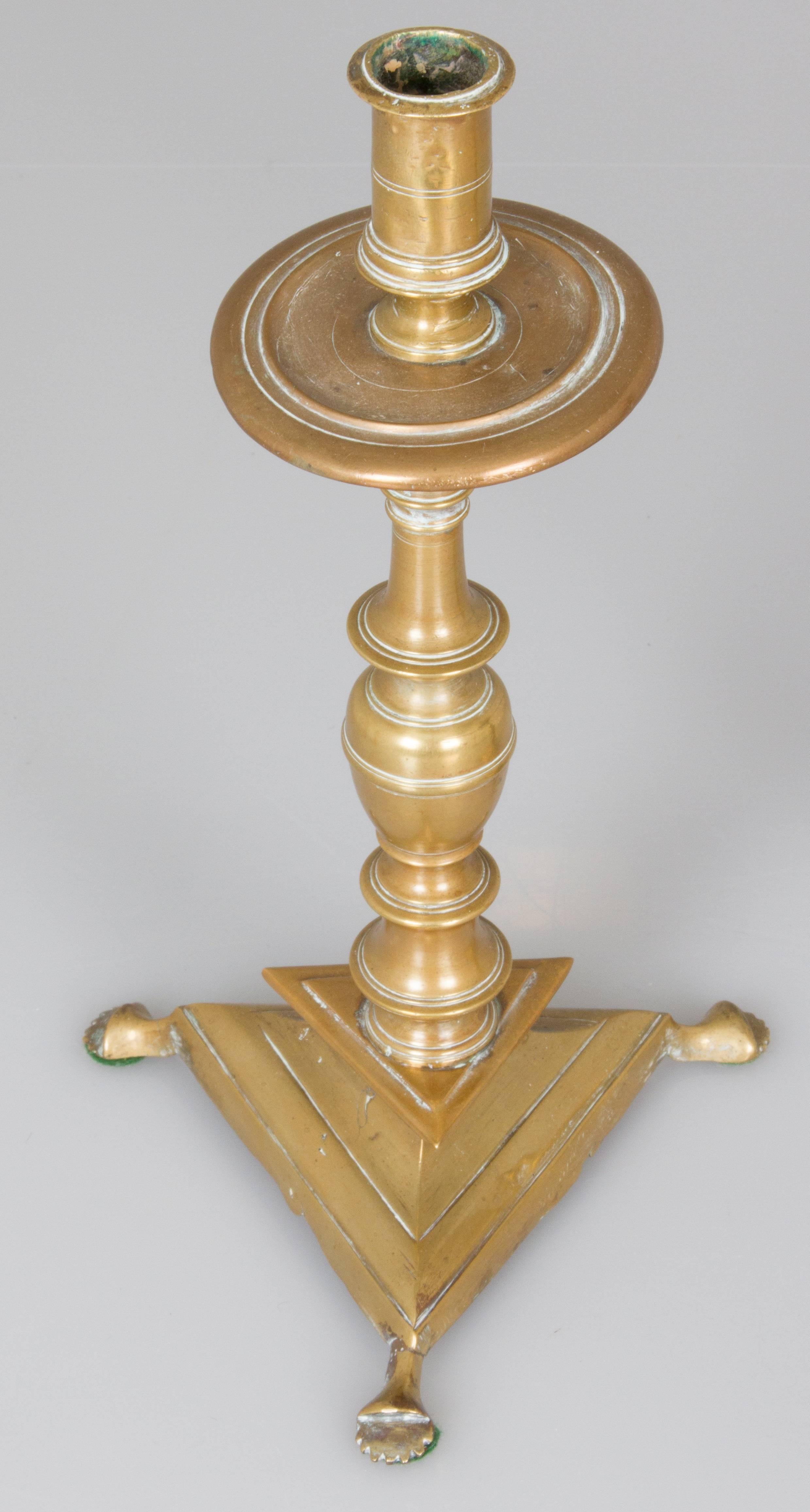 Two Near Pairs of Brass Footed Candleholders 1