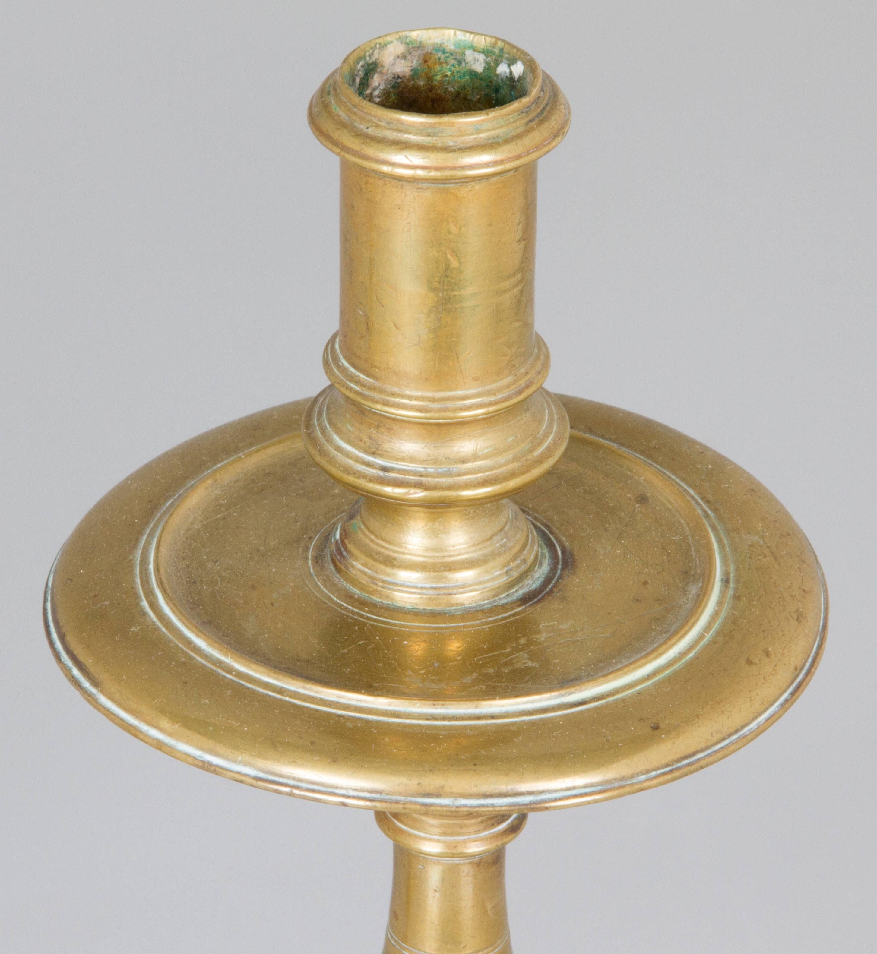 Two Near Pairs of Brass Footed Candleholders 4