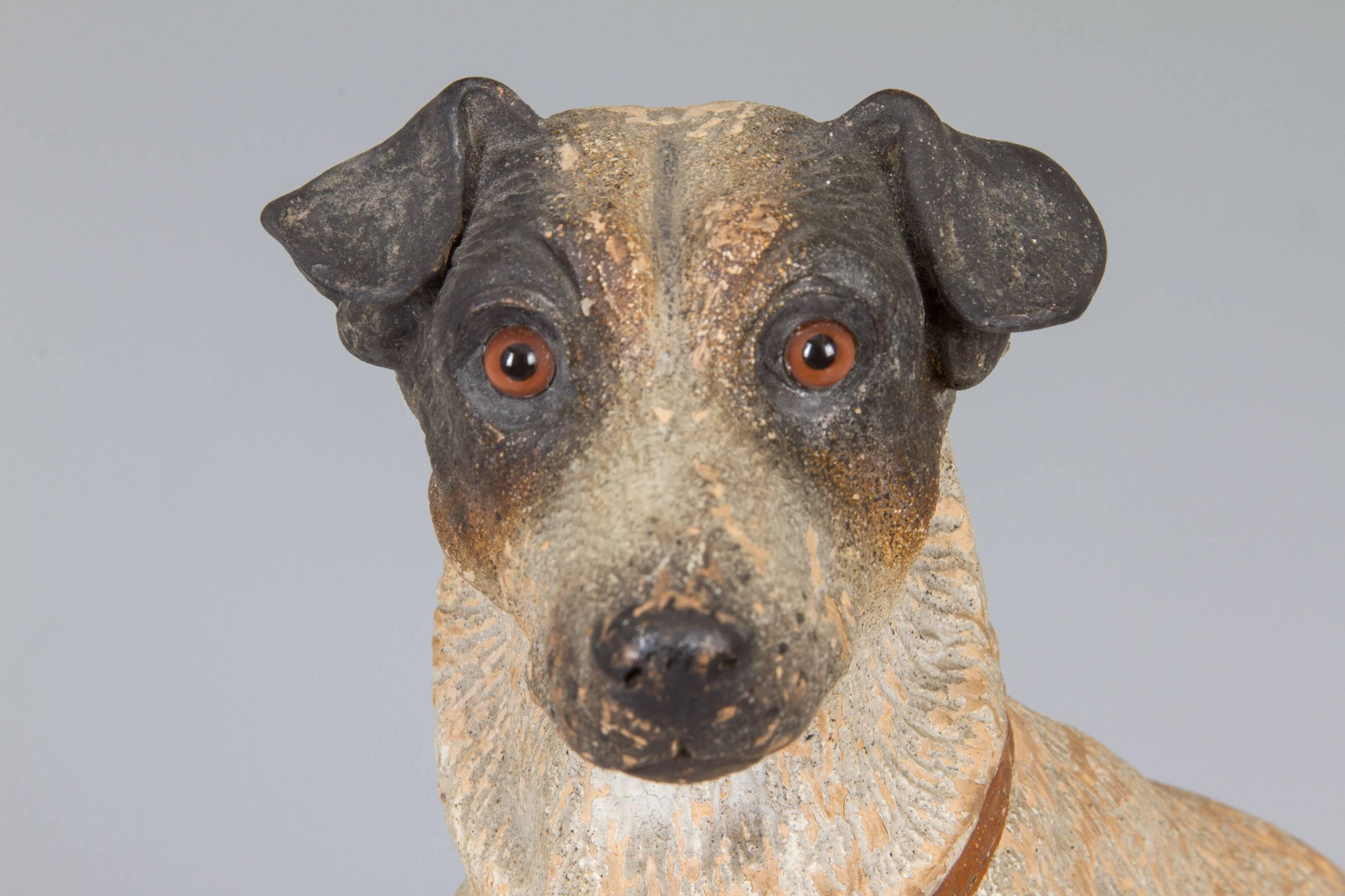 Having glass eyes, the likeness of this dog is nicely captured. We believe this piece dates to circa 1910.