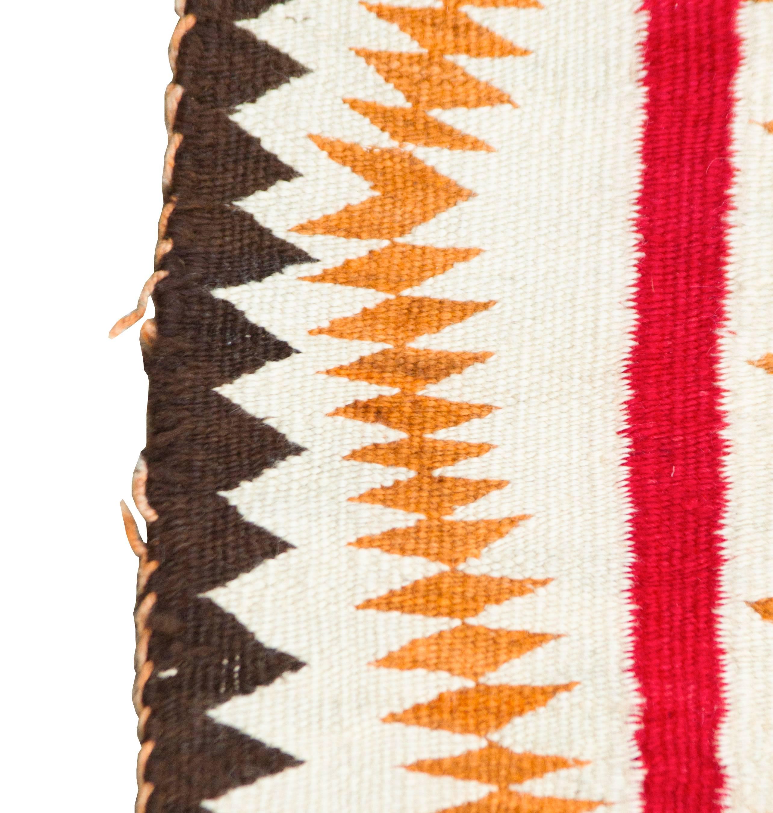 This is an unusual rug, having different design elements unified by color and positive and negative space.
