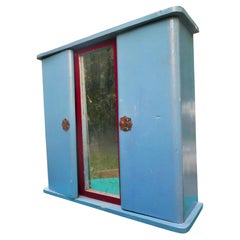 Miniature wardrobe. Oxidized mirror