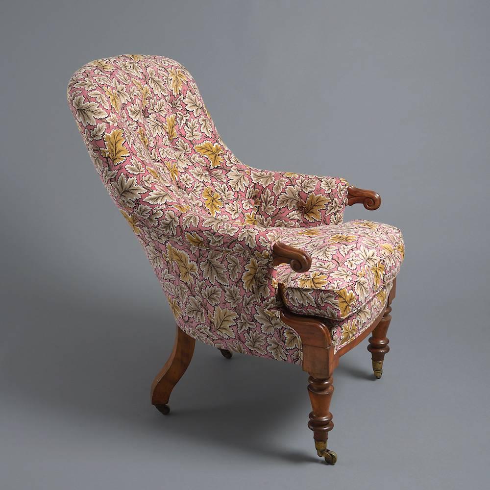 An early Victorian satin birch armchair, circa 1850.
 