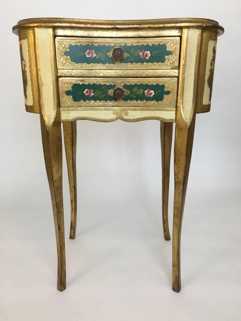 Beautiful Florentine Italian painted table with drawers. Perfect as a bedside table, next to a reading chair or used a small vanity table. It could also be great at the end of a narrow hallway with a mirror or artwork hung above it. The drawers are