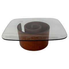 Mid Century Vladimir Kagan “Snail” coffee table in Walnut and Glass