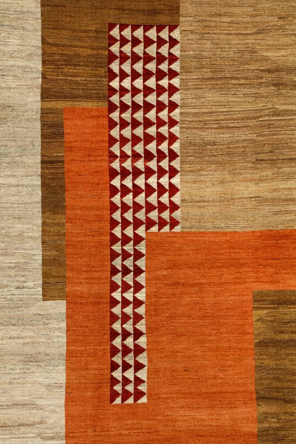 With vibrant orange tones throughout, this pure wool carpet inspired by Art Deco traditions utilizes the same handspun wool and organic vegetable dyes as all the pieces from the Orley Shabahang signature collection of contemporary carpets. This