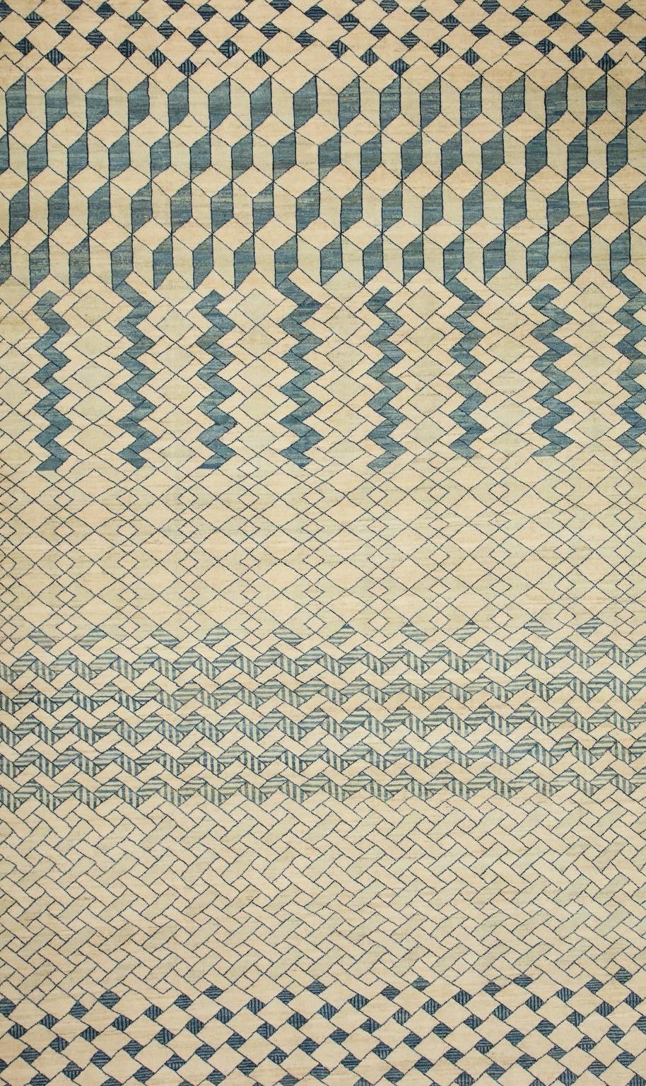 This signature Orley Shabahang carpet in handspun wool and organic vegetable dyes was created using a hand-knotted pile, cotton warp and wool weft. From the Architectural Collection, the design exhibits a striated indigo pattern amid an undyed cream