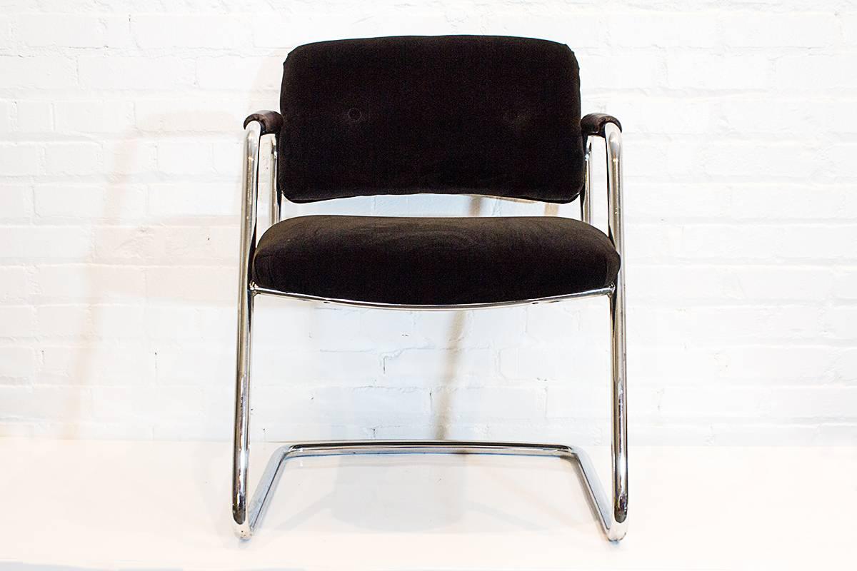 Sleek cantilever armchair from the 1980s. Very sturdy contract seating with a sleek Mid-Century style. Reupholstered in chocolate velvet microfiber with leather arm caps. 

26" D x 24" W x 31" H.
Seat: 18" D x 21" W x