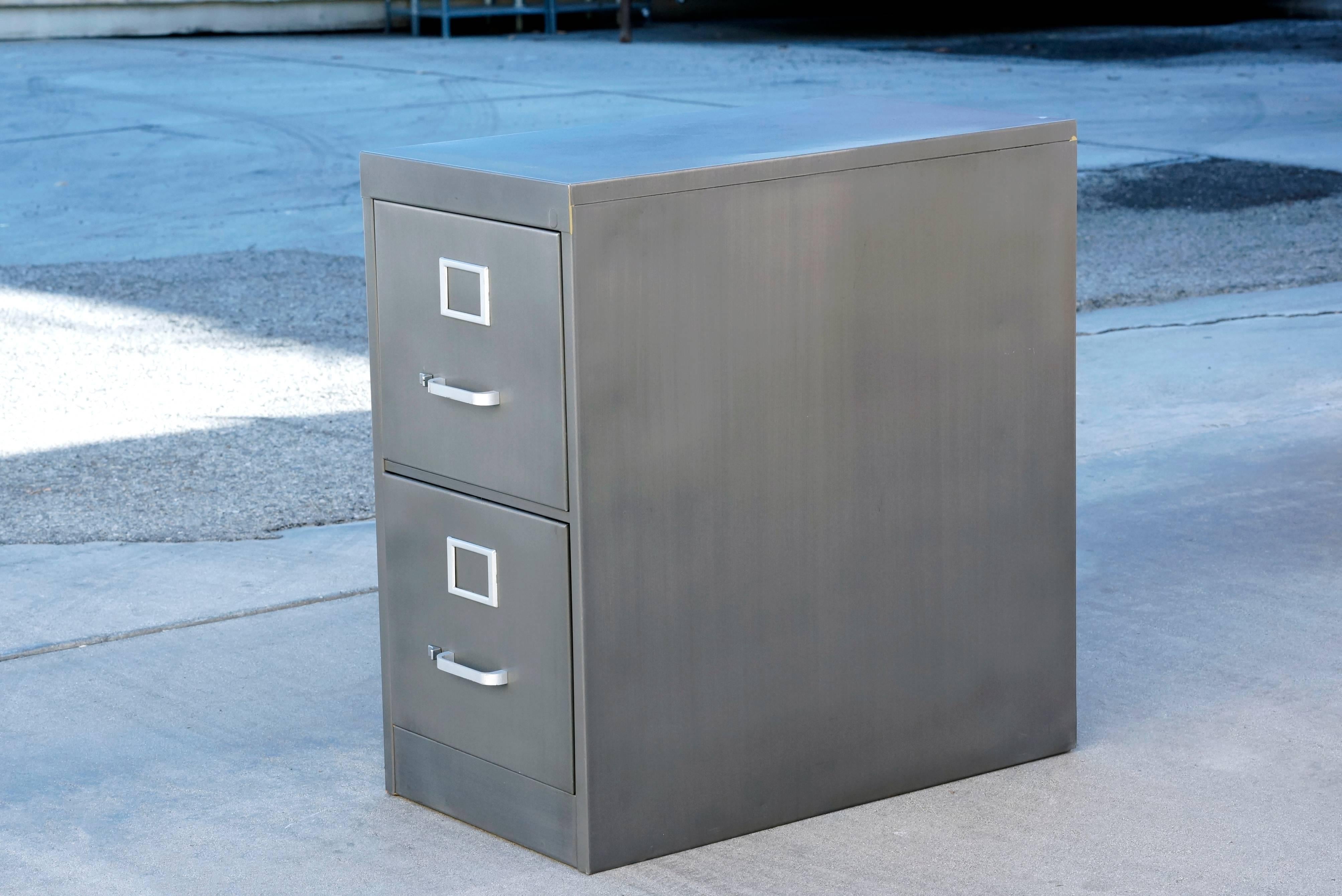 Classic 1960s tanker filing cabinet refinished in custom colors. Pictured here in 
