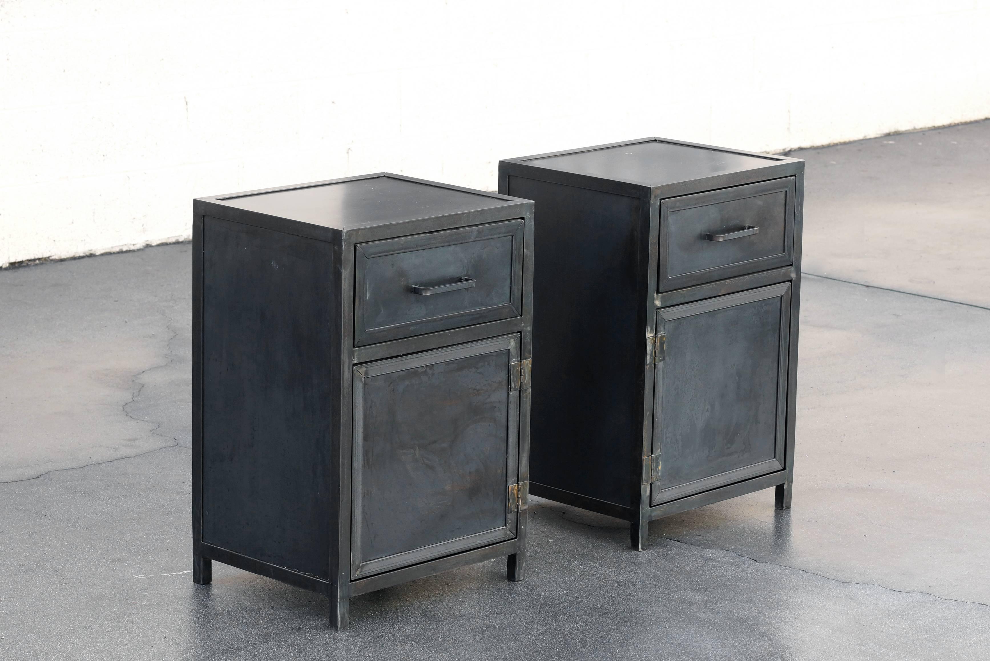 Industrial yet sleek pair of lowboy steel cabinets by Rehab Vintage Interiors, Los Angeles. Designed in the spirit of the Machine Age our cabinets are built with 1