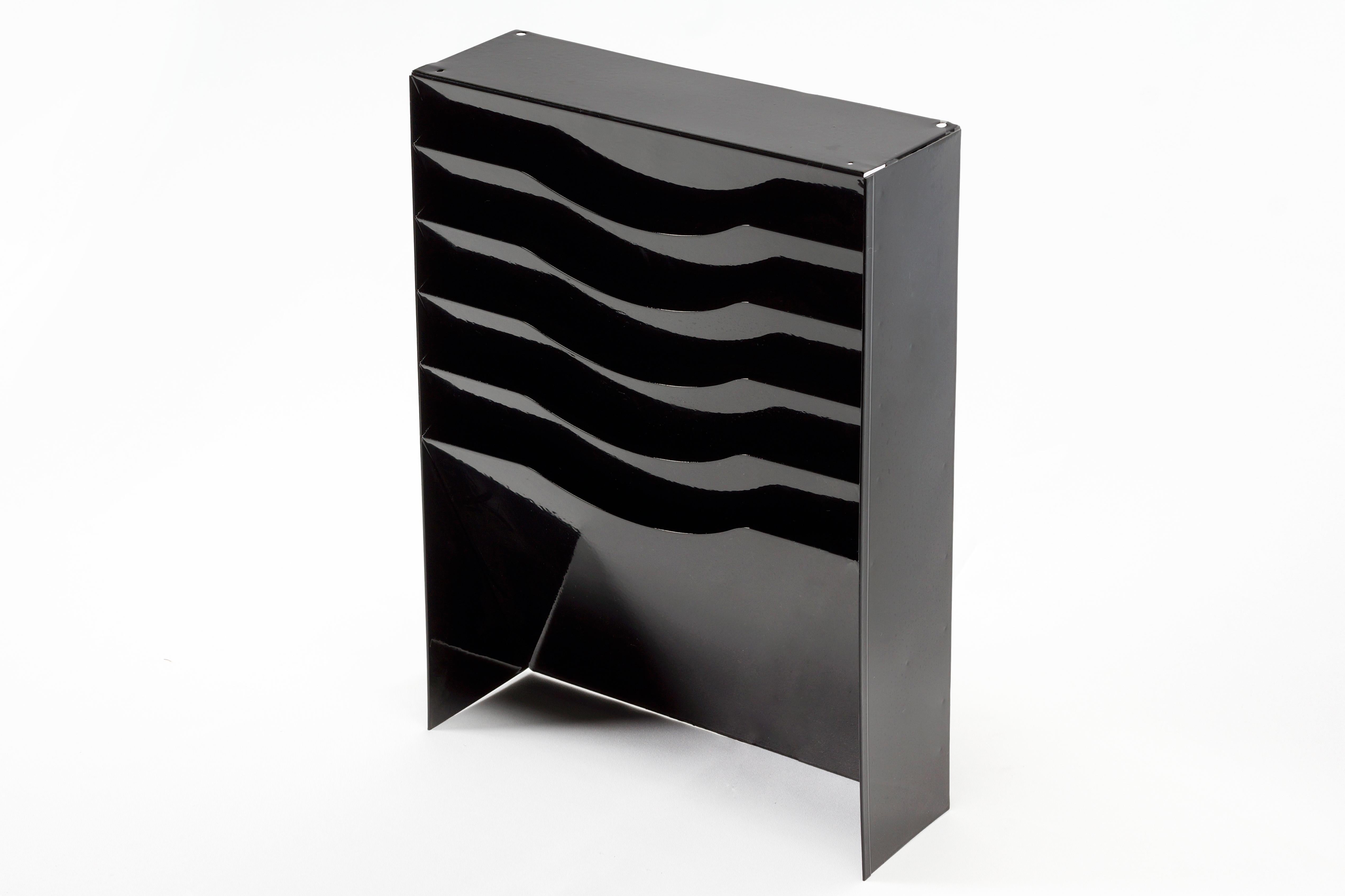 Vintage file holder or magazine rack refinished in gloss black powder coat. Once the drawer insert to a tanker piece, we repurposed it for versatile use. This functional, retro style piece is perfect for getting any home or office organized. Easily