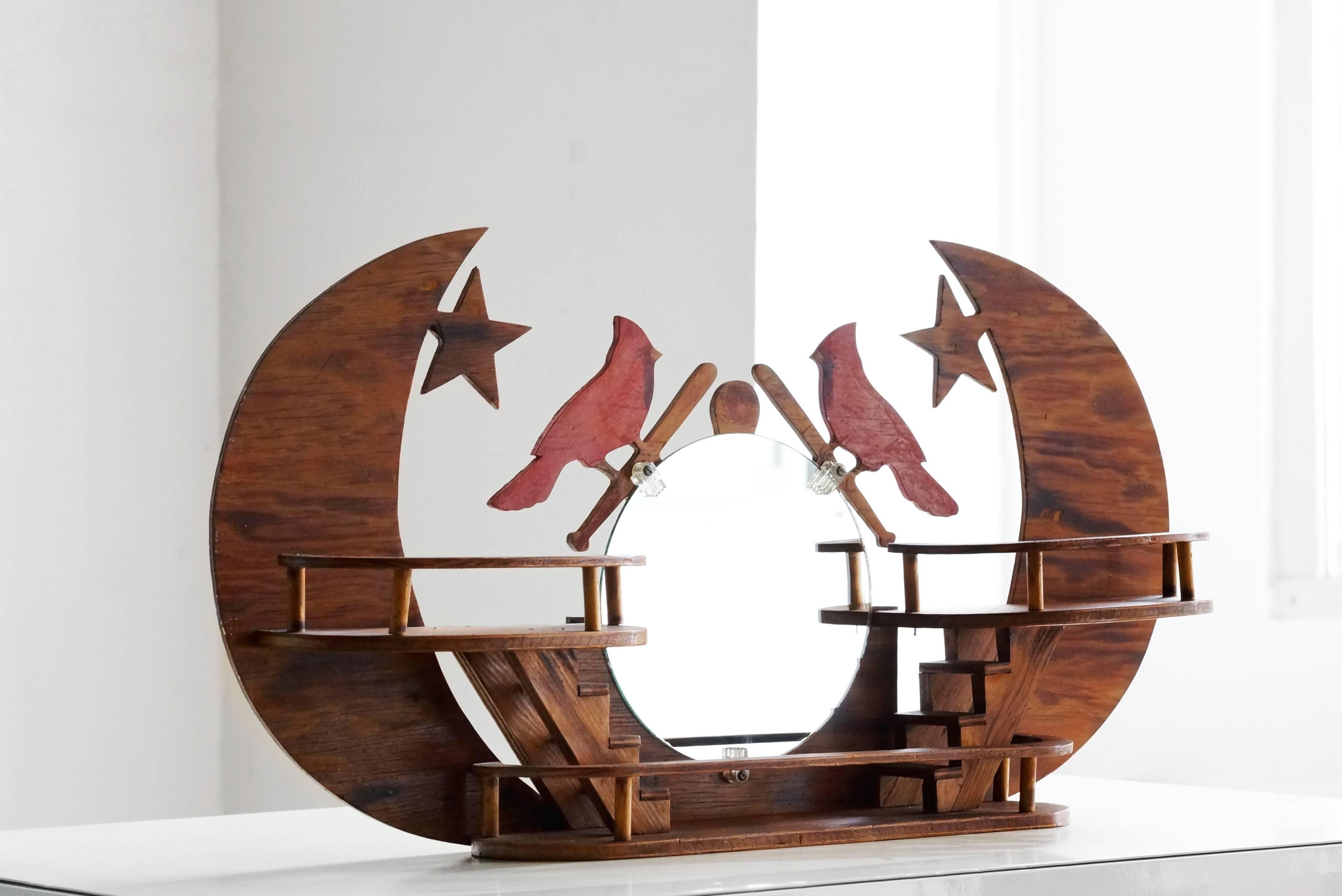 Unique handmade wooden wall-sculpture/ display piece with mirror celebrating the St. Louis Cardinals. Fine example of American Folk Art; excellent craftsmanship. 

Dimensions: 28" w 4" d x 14" h 