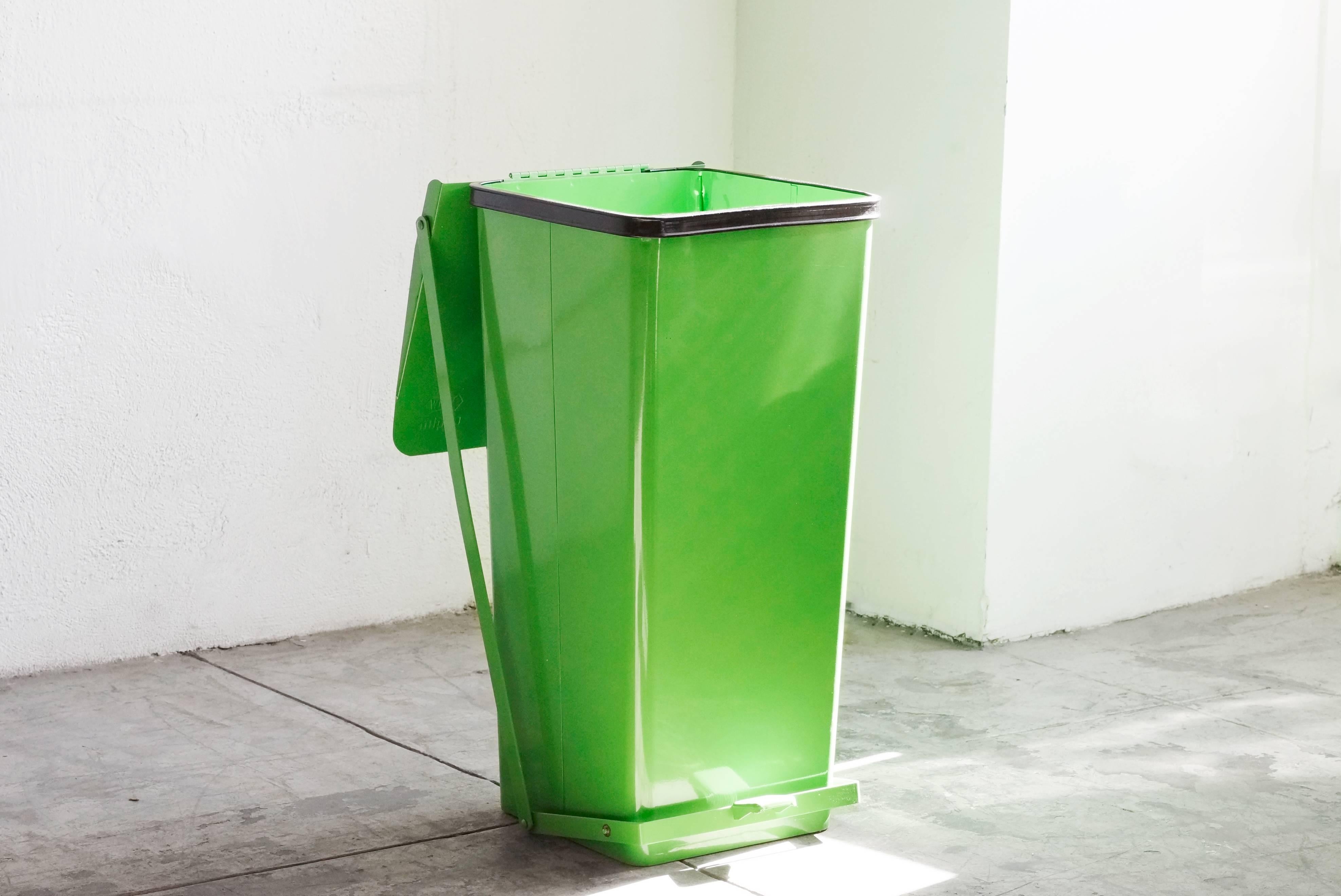 Vintage storage bin with push pedal, refinished in lime green. This tall, heavy duty storage piece by White Mipro was originally conceived as a hospital hamper. Also suitable as trash can.

Dimensions: 15