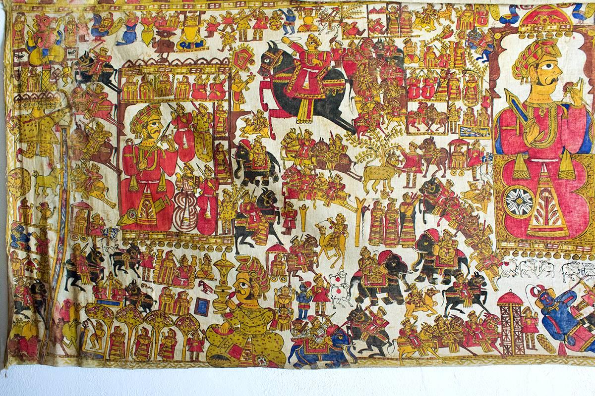 A gorgeous tapestry depicting the life of Pabuji, a local hero from the Mewar region of Rajasthan.  Minstrels traveled with these and used them to sing of the exploits of Pabuji.
 
Unusual size of 53